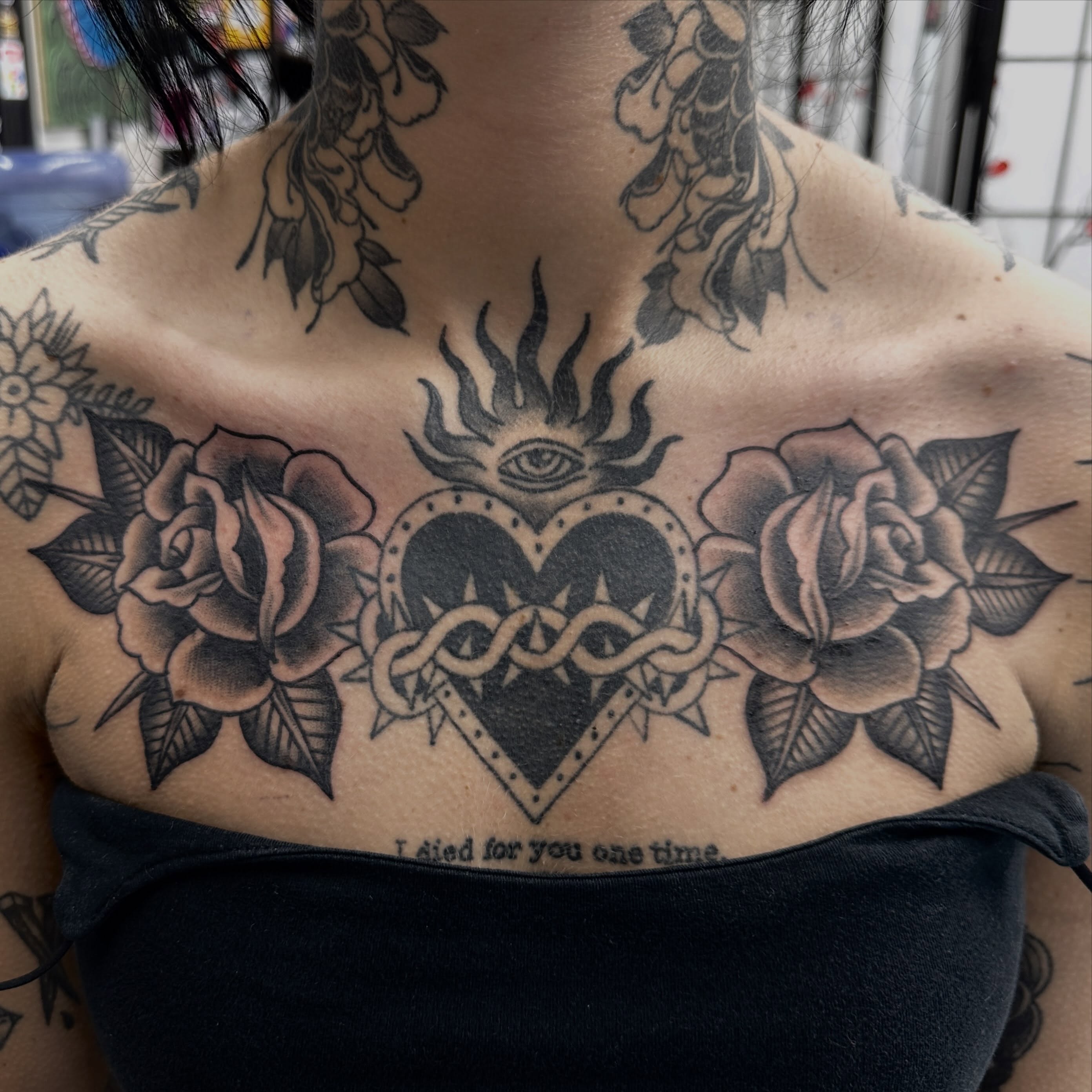 Heart with snake American traditional tattoo on the chest by Fil Ponte