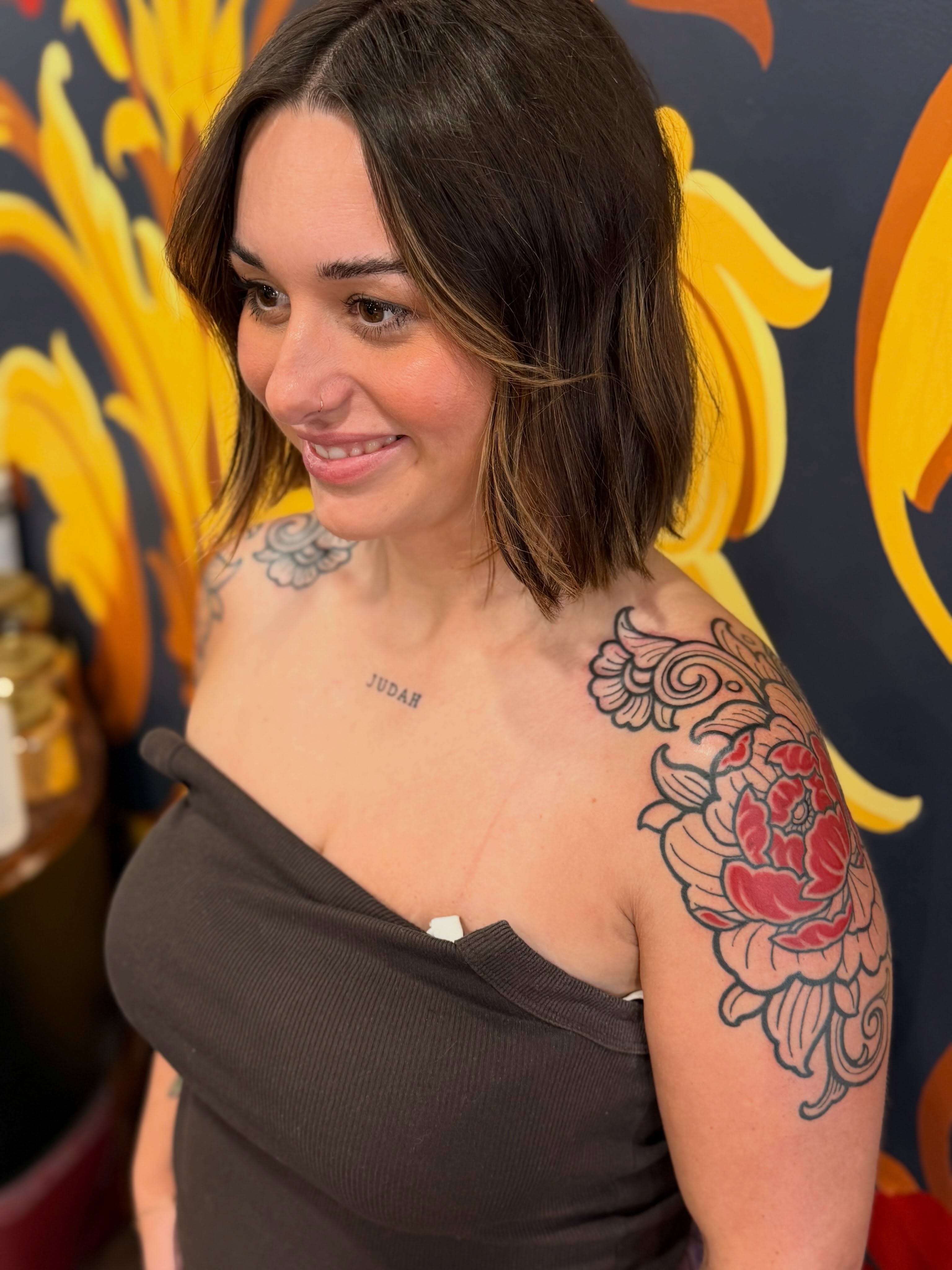 Floral American traditional tattoo on the shoulder by English Cousins, Nashville, Tennessee