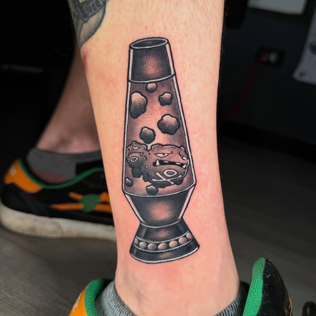 Lava lamp dotwork tattoo on the calf by Beau Zeis