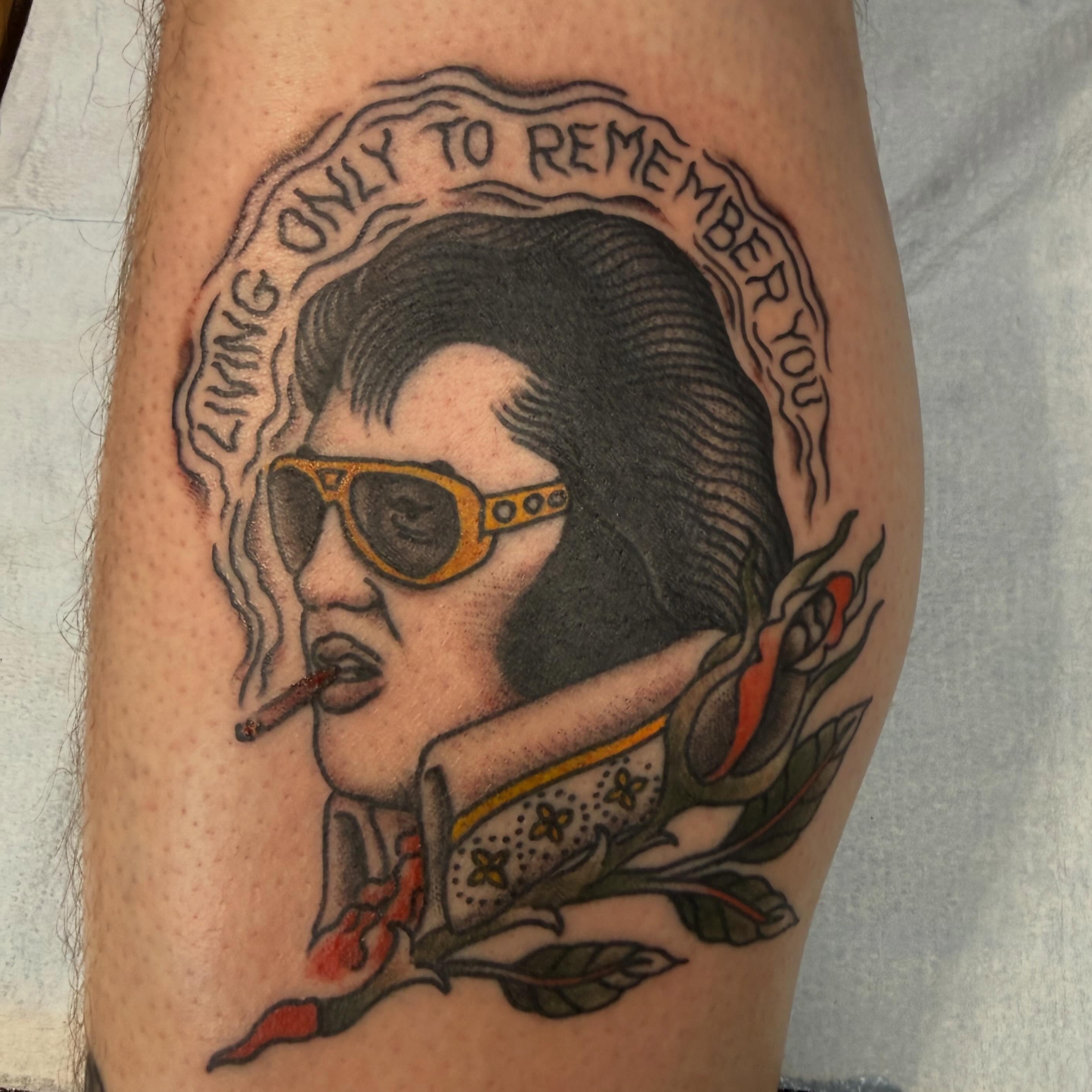 Elvis presley American traditional tattoo on the thigh by Tony Beuke