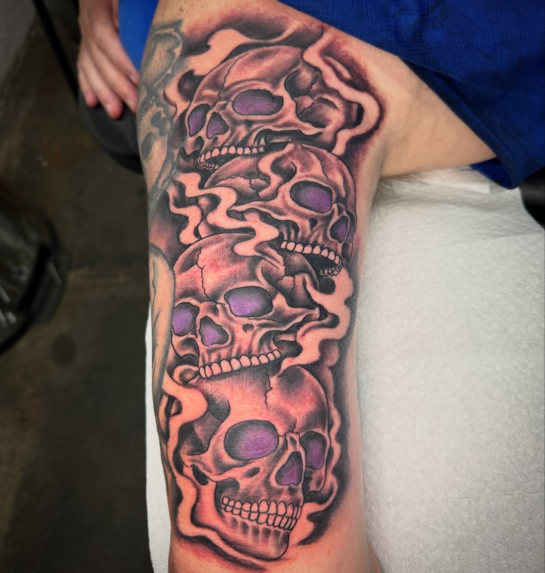 Skulls realism tattoo on the thigh by Jake Horstman, Dayton, Ohio