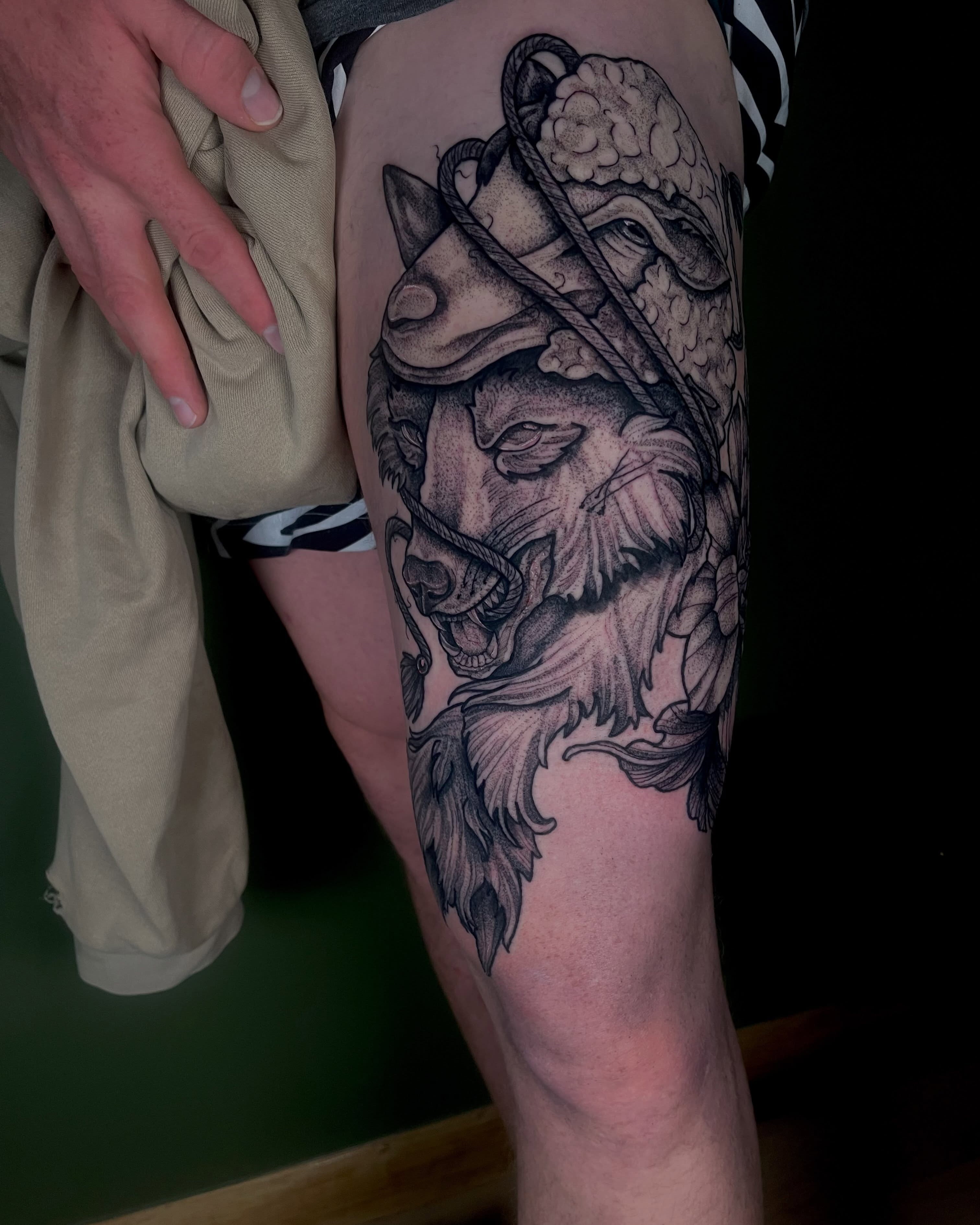 Lion with helmet realism tattoo on the thigh by Destiny Tolman