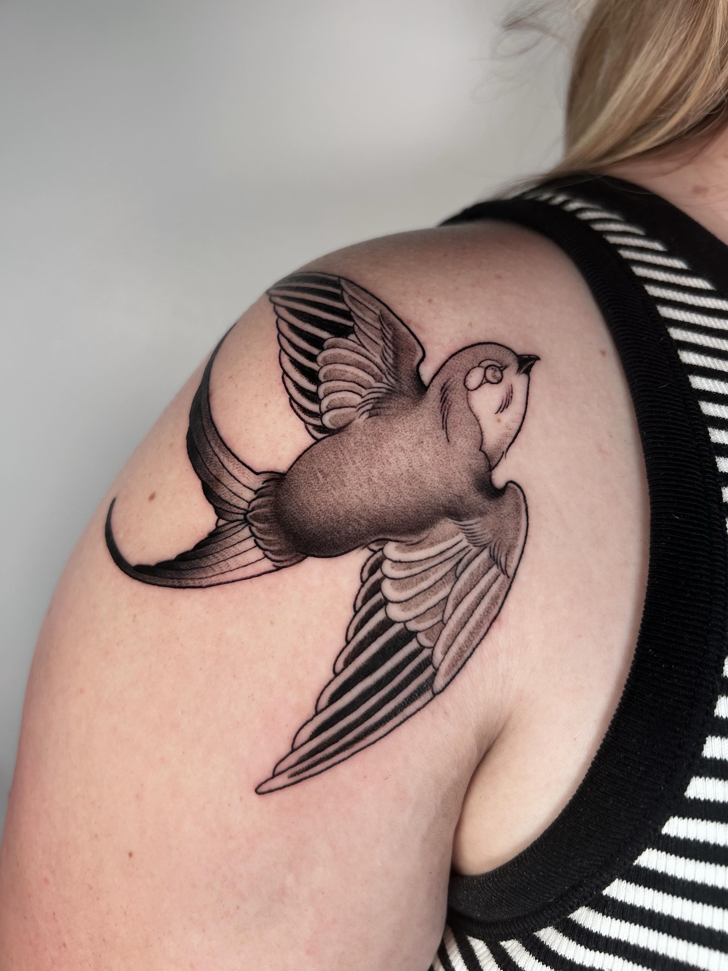 Swallow black and grey tattoo on the shoulder by Salt Lake City tattoo artist