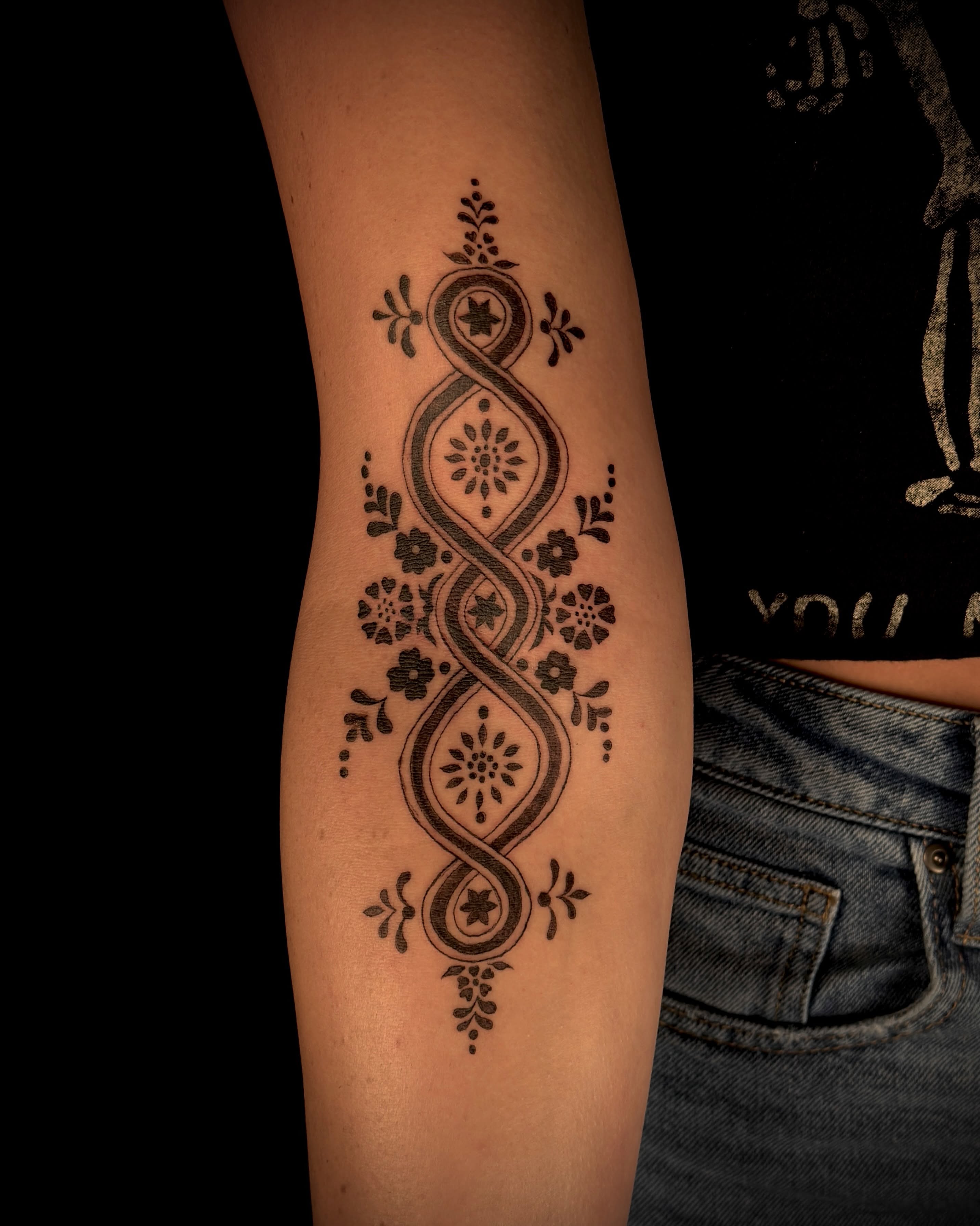 Infinity symbol with floral patterns ornamental tattoo on the forearm by ollie b ⋆⟡⋆, Dayton, Ohio