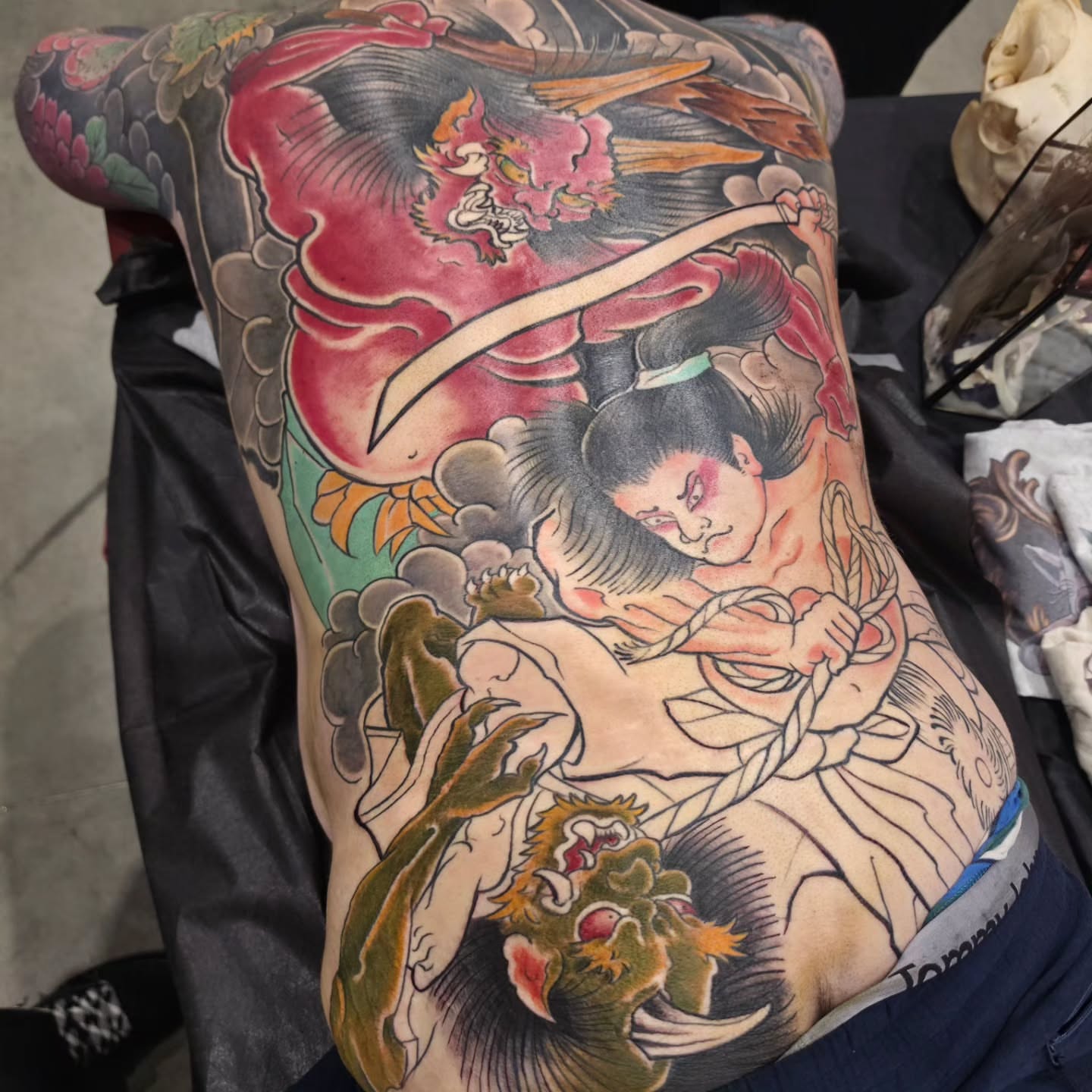 Geisha and demons japanese irezumi tattoo on the thigh by Barrett Handel