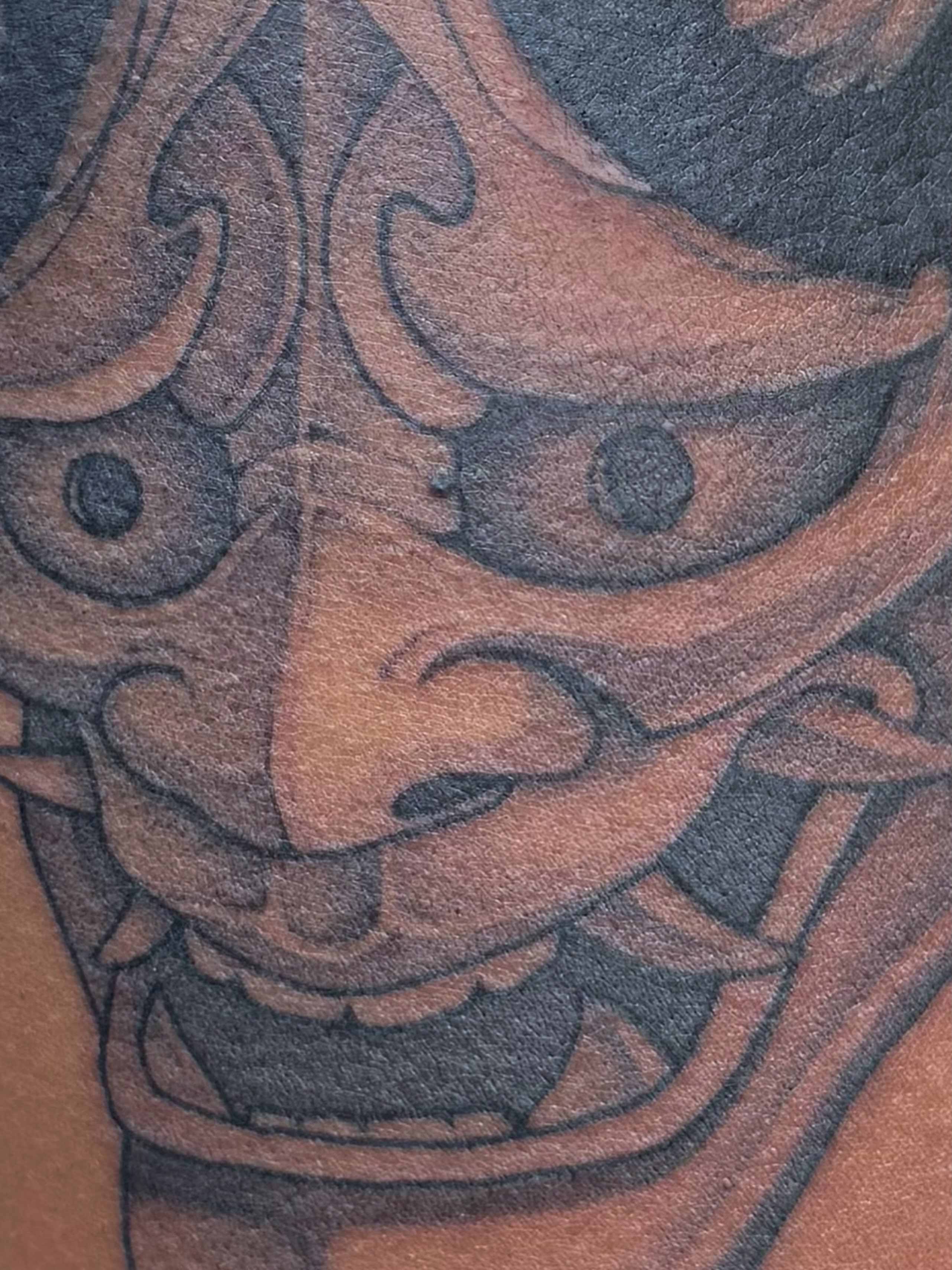 Demon mask japanese irezumi tattoo on the chest by 𝔍𝔞𝔯𝔢𝔡 𝔞𝔩𝔩𝔢𝔫