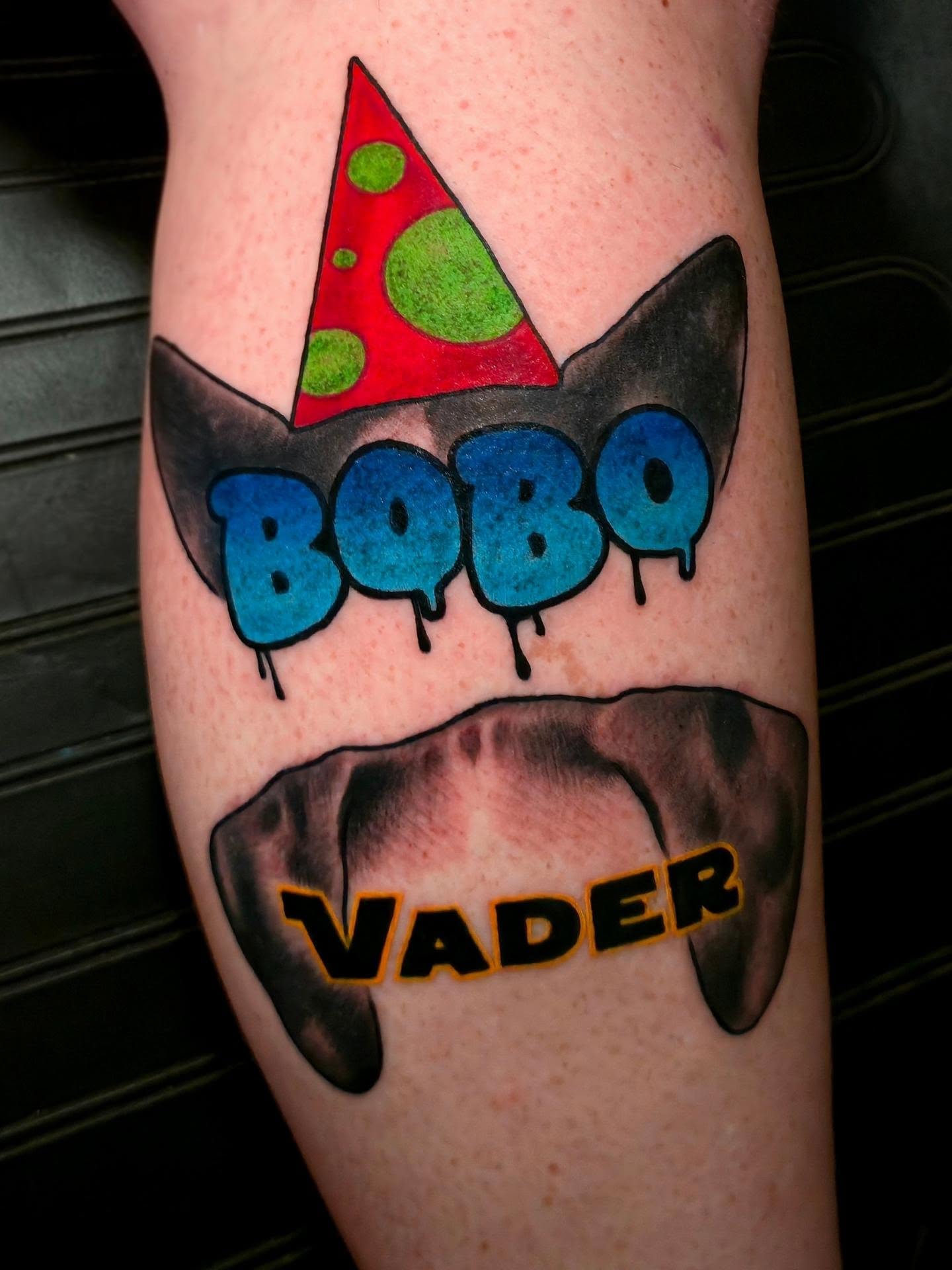 Pizza slice trash polka tattoo on the forearm by Joey Vinci, Phoenix, Arizona