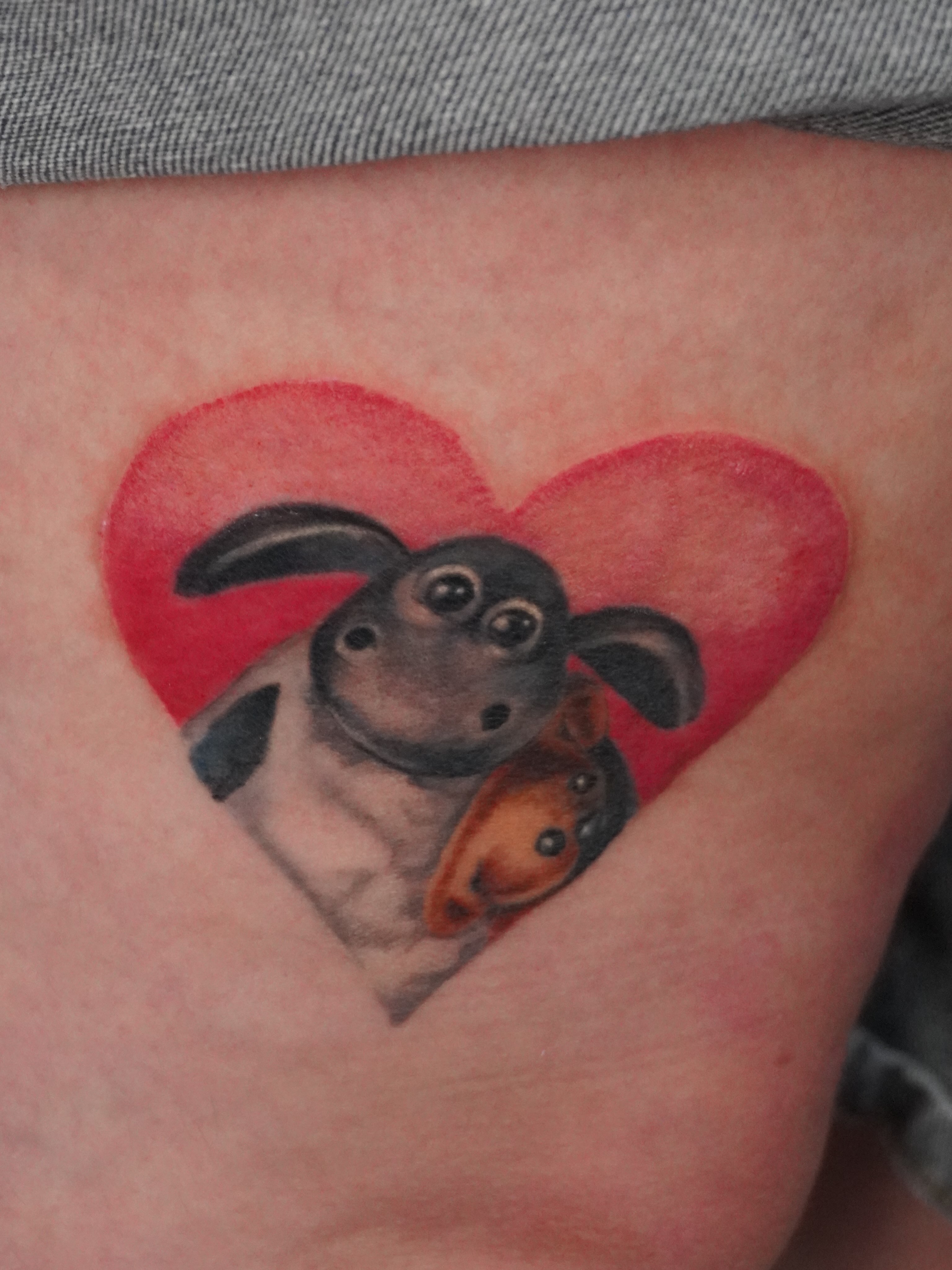 Rabbit and heart realism tattoo on the thigh by hallow ☣︎ tattoo artist, Philadelphia, Pennsylvania