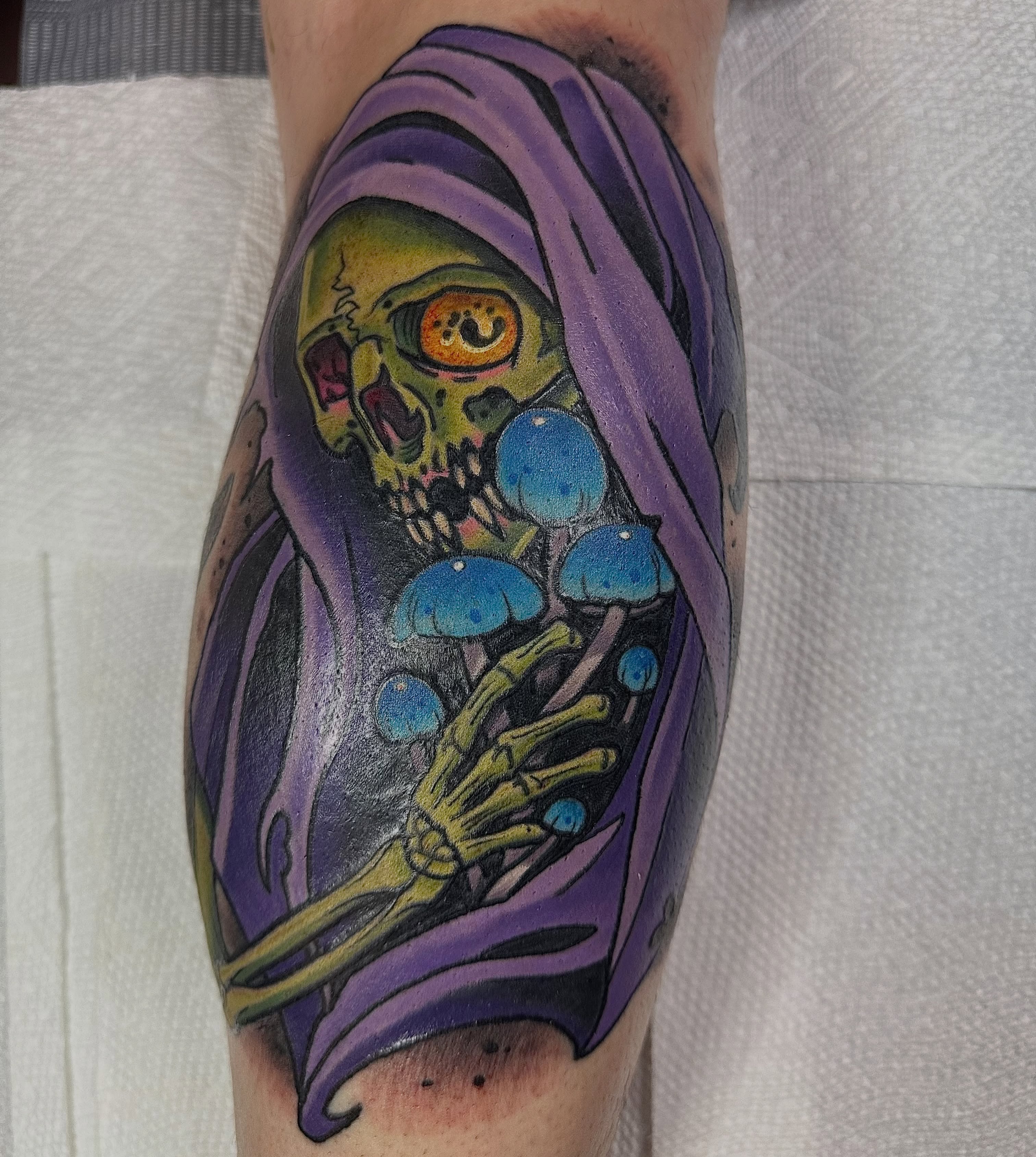 Mushroom skull dark realism tattoo on the forearm by Edward Knowles