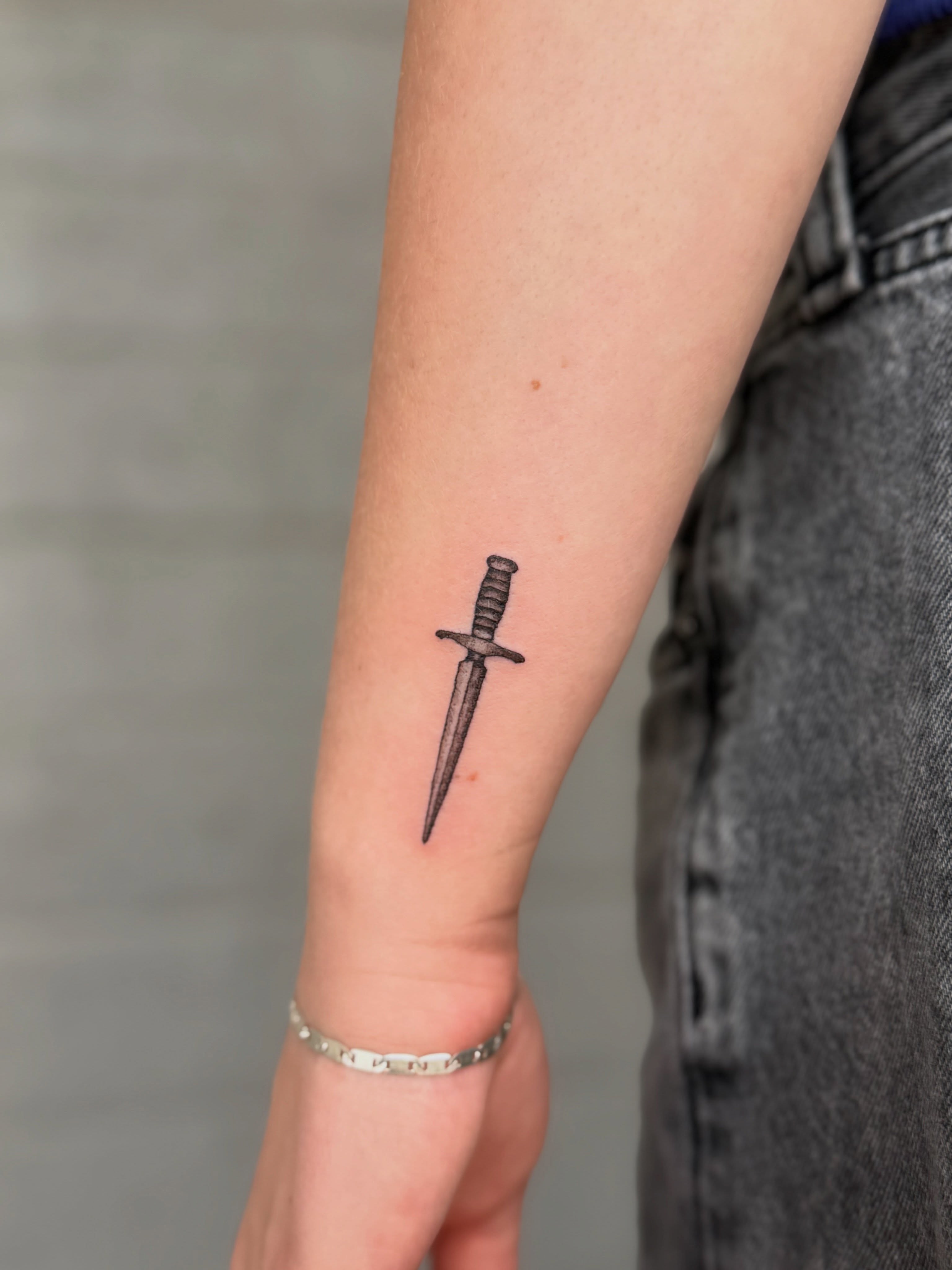 Knife black and grey tattoo on the forearm by Jocelyne ♡