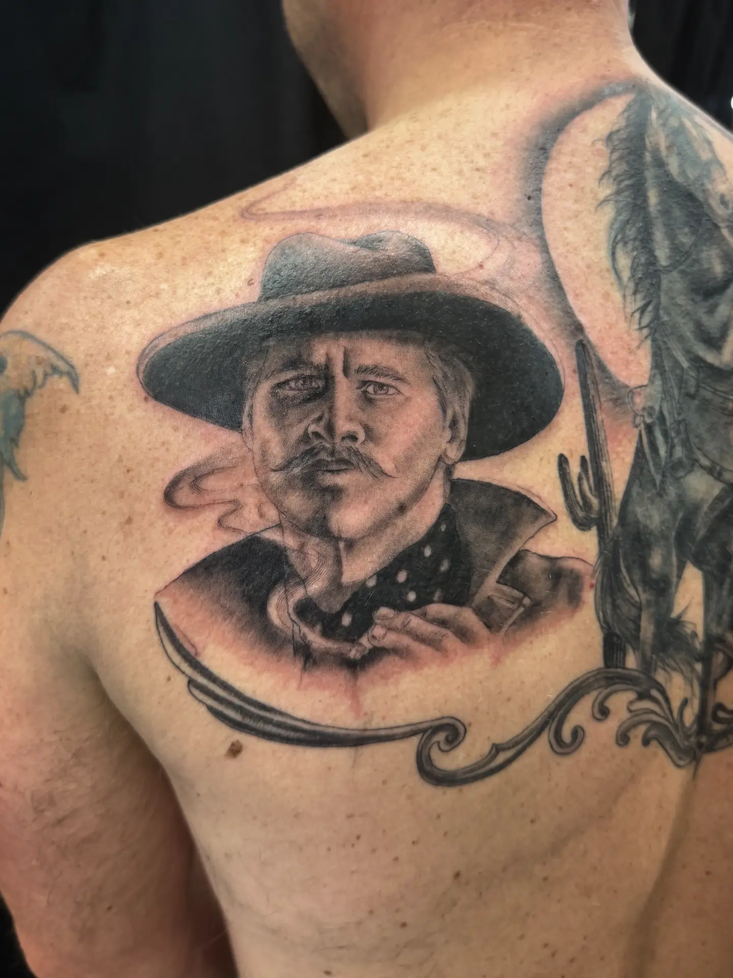 Cowboy portrait realism tattoo on the chest by Katherine