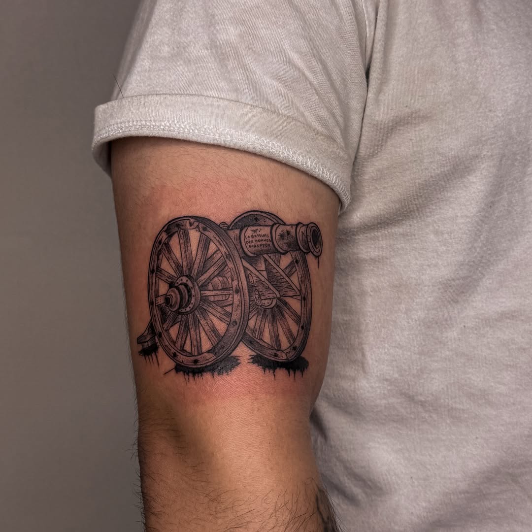 Cannon black and grey tattoo on the forearm by Las Vegas Tattoo Artist