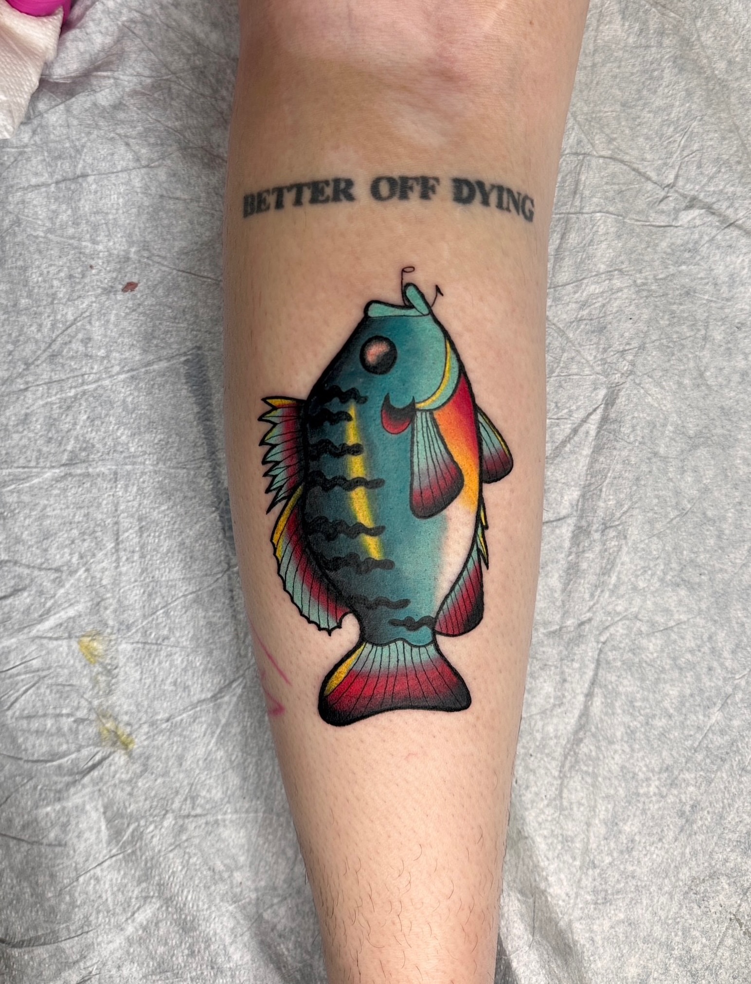 Fish American traditional tattoo on the forearm by Alexandrea Arendell