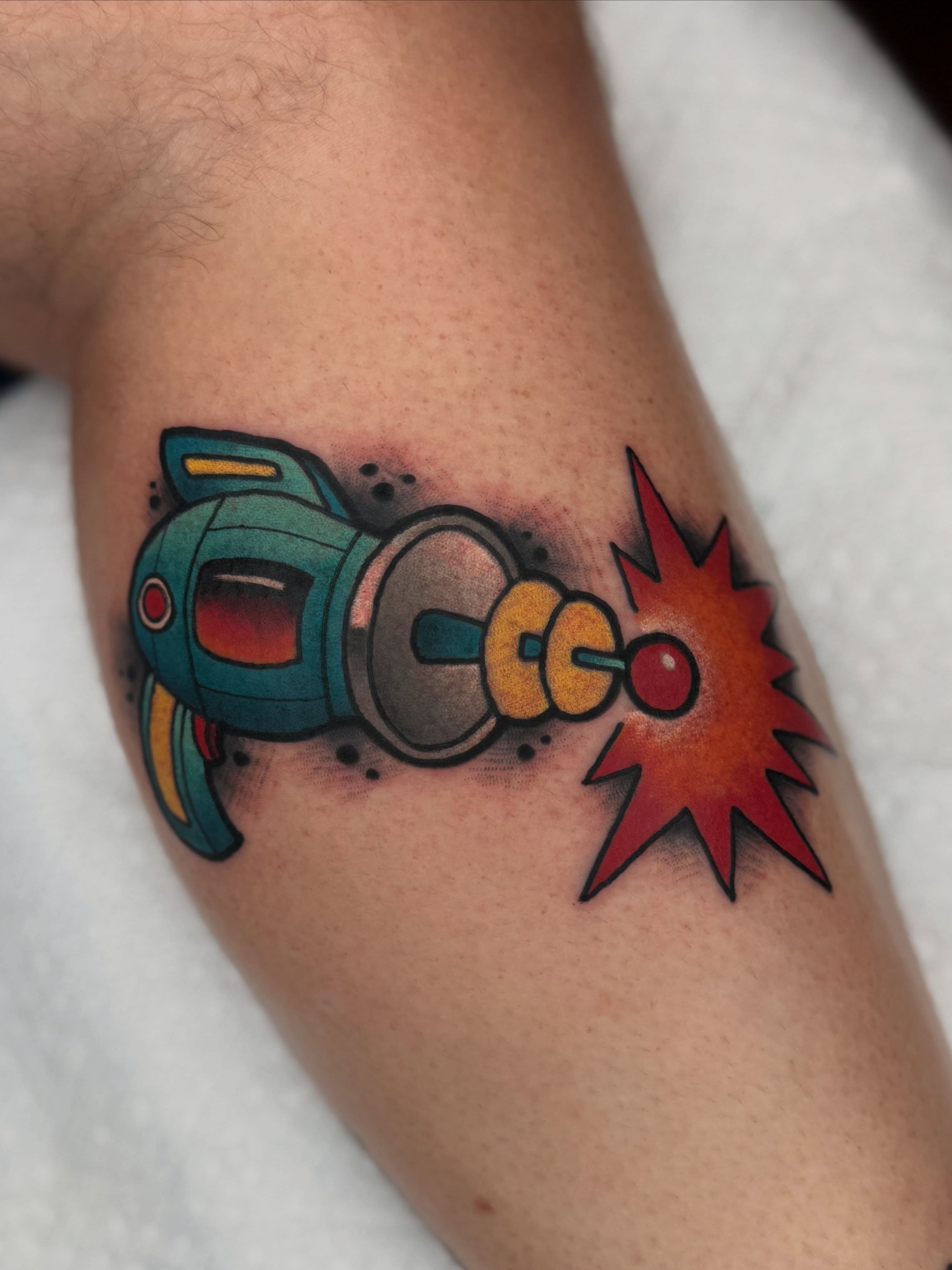 Space gun new school tattoo on the forearm by T Dubs ✏️