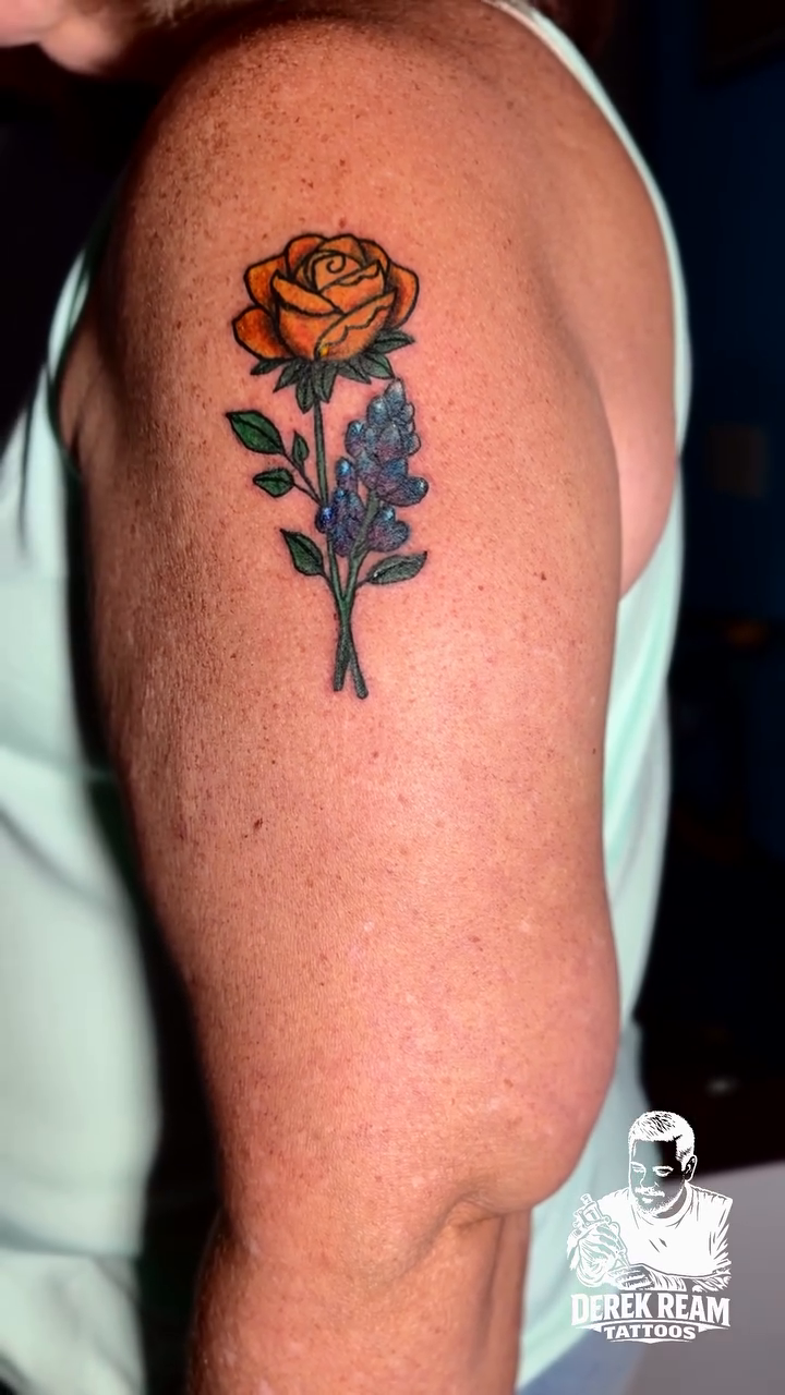 Rose and flowers fine line tattoo by Derek Ream