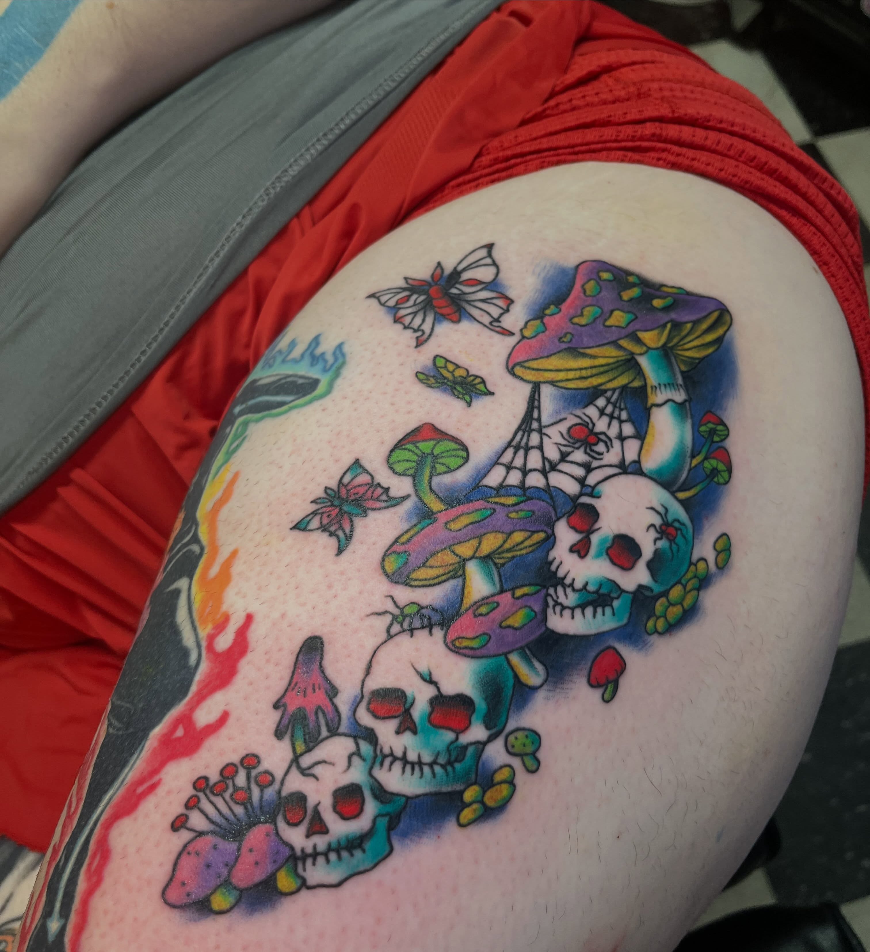 Skulls and mushrooms American traditional tattoo on the thigh by Sean Swanson Tattoo Salem Oregon, Salem, Oregon
