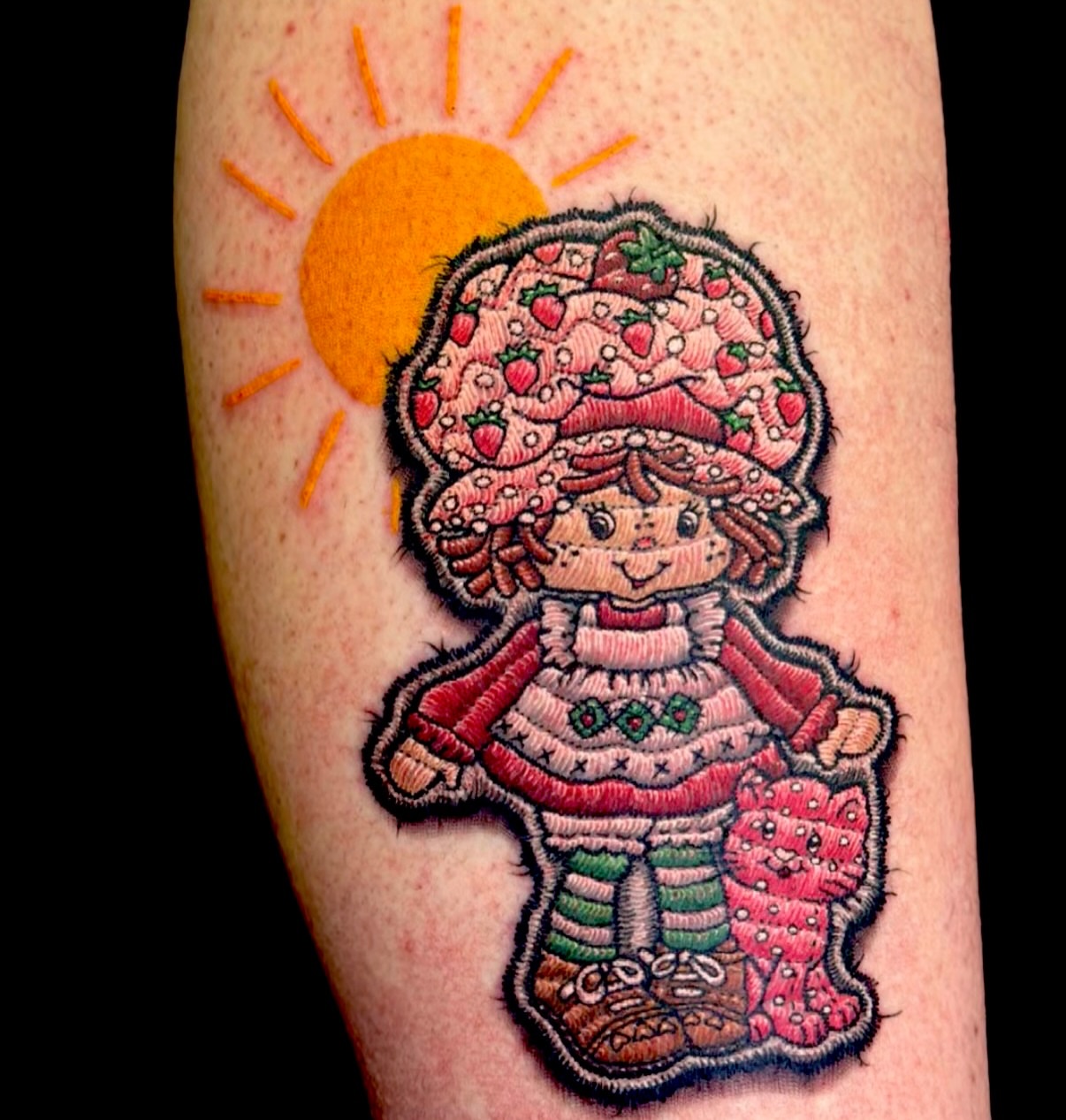 Strawberry shortcake doll American traditional tattoo on the forearm by 𝓡𝓪𝔂𝓬𝓱𝓲𝓵𝓵 [ᴛᴀᴛᴛᴏᴏ ᴀʀᴛɪꜱᴛ] 💚