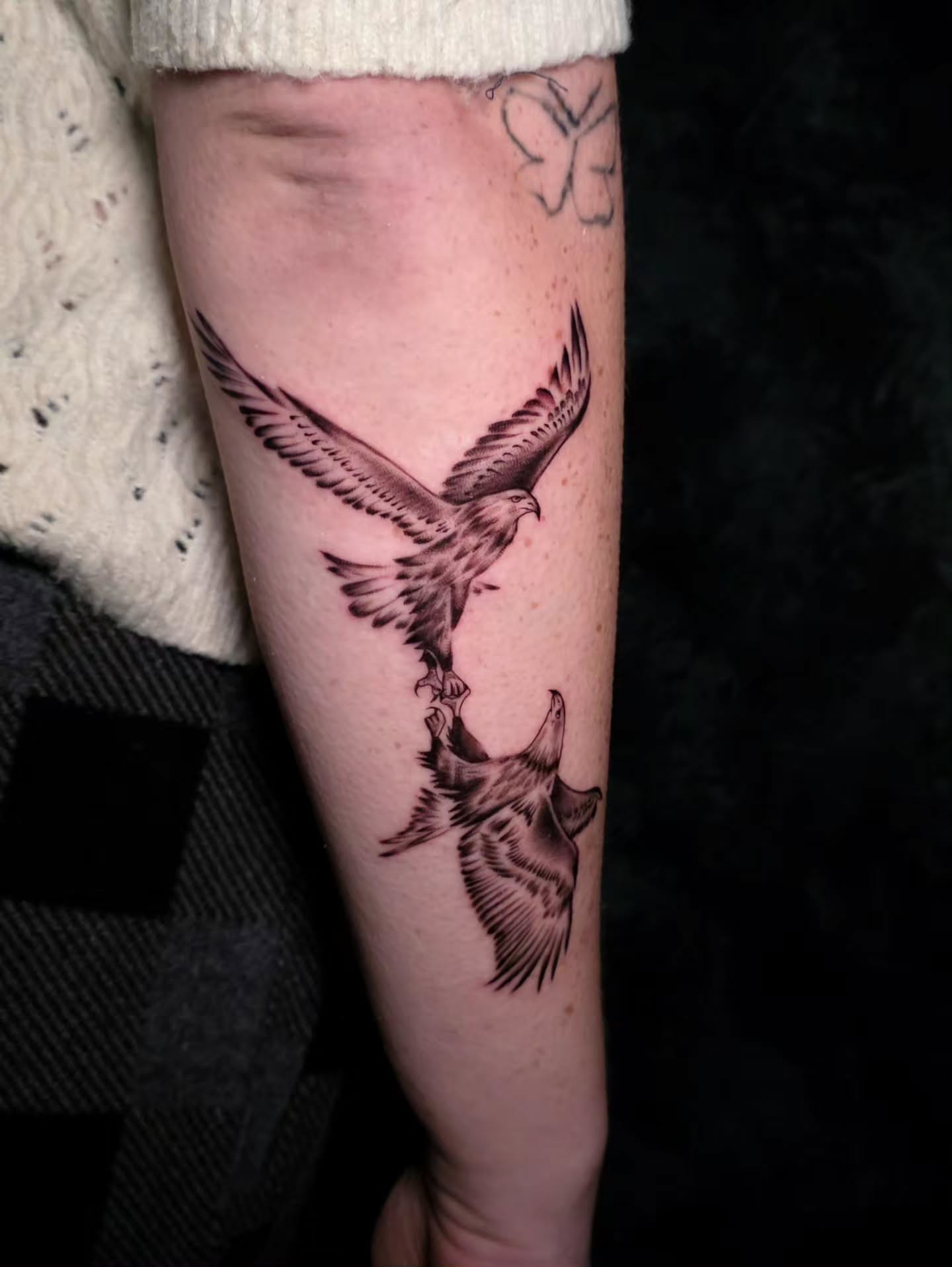 Eagle and fish black and grey tattoo on the forearm by Ashley Johnson, Knoxville, Tennessee