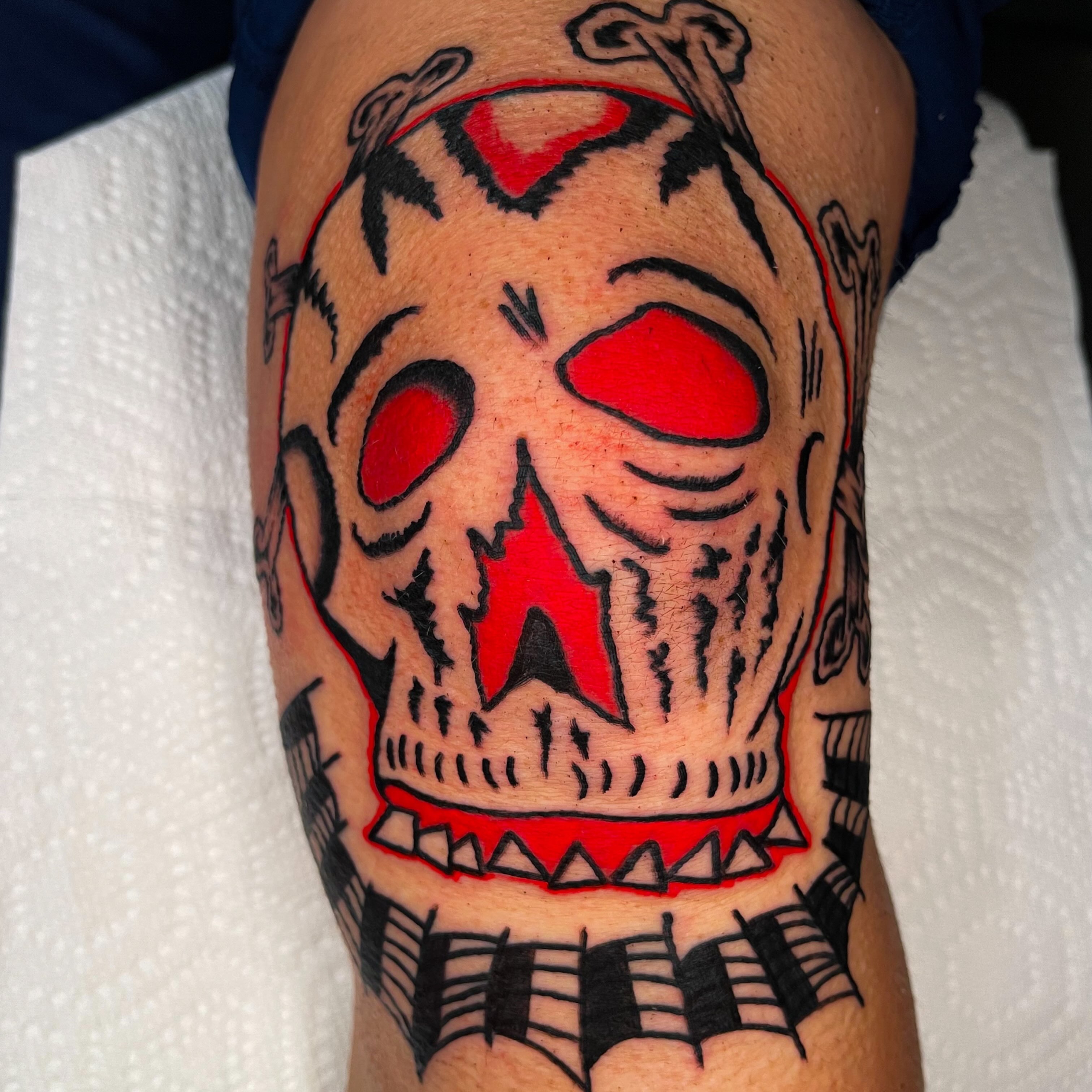 Clown skull American traditional tattoo on the forearm by Devyn Hightower