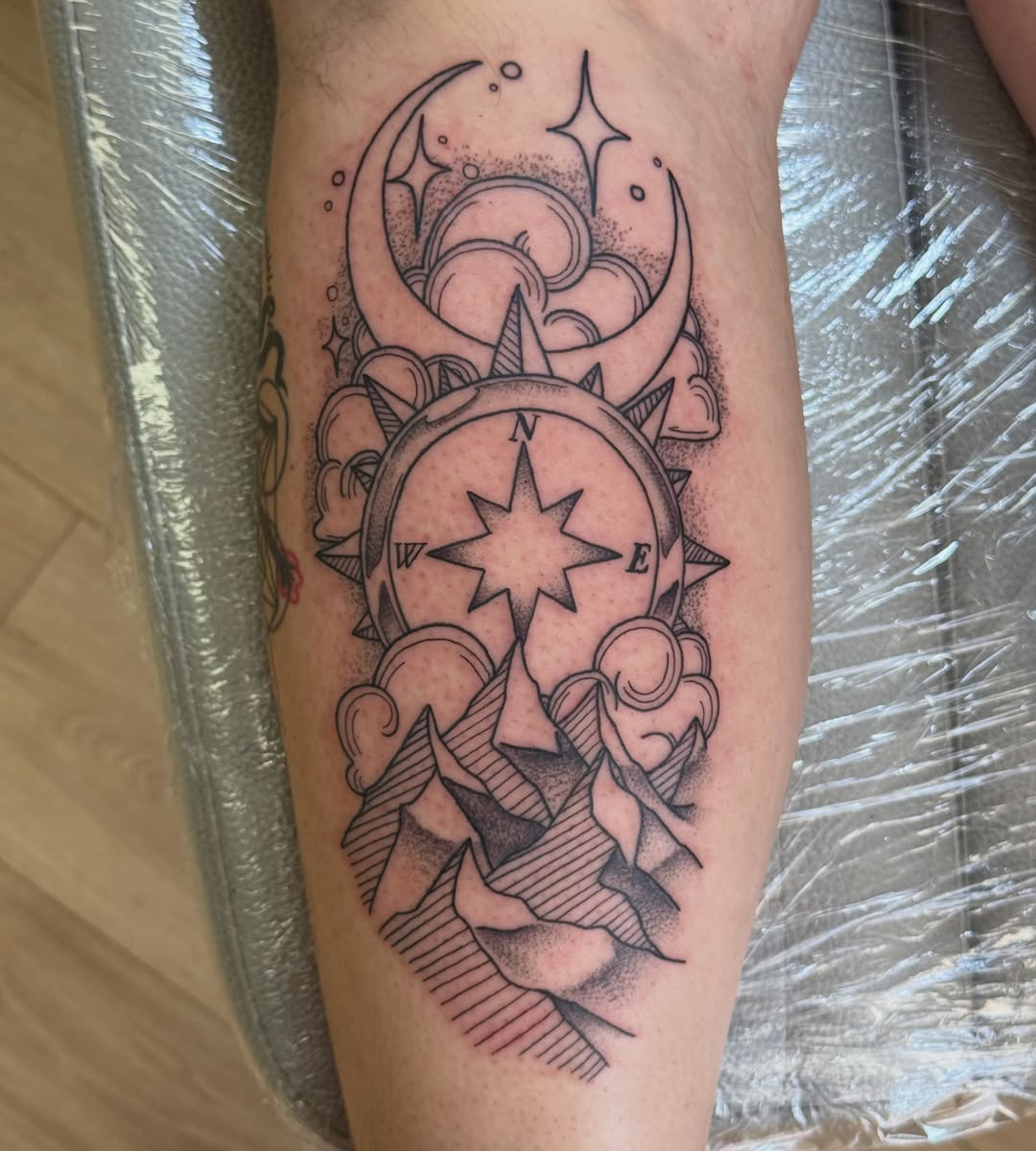 Compass and celestial elements dotwork tattoo on the forearm by Stvn Geyer, Urbandale, Iowa