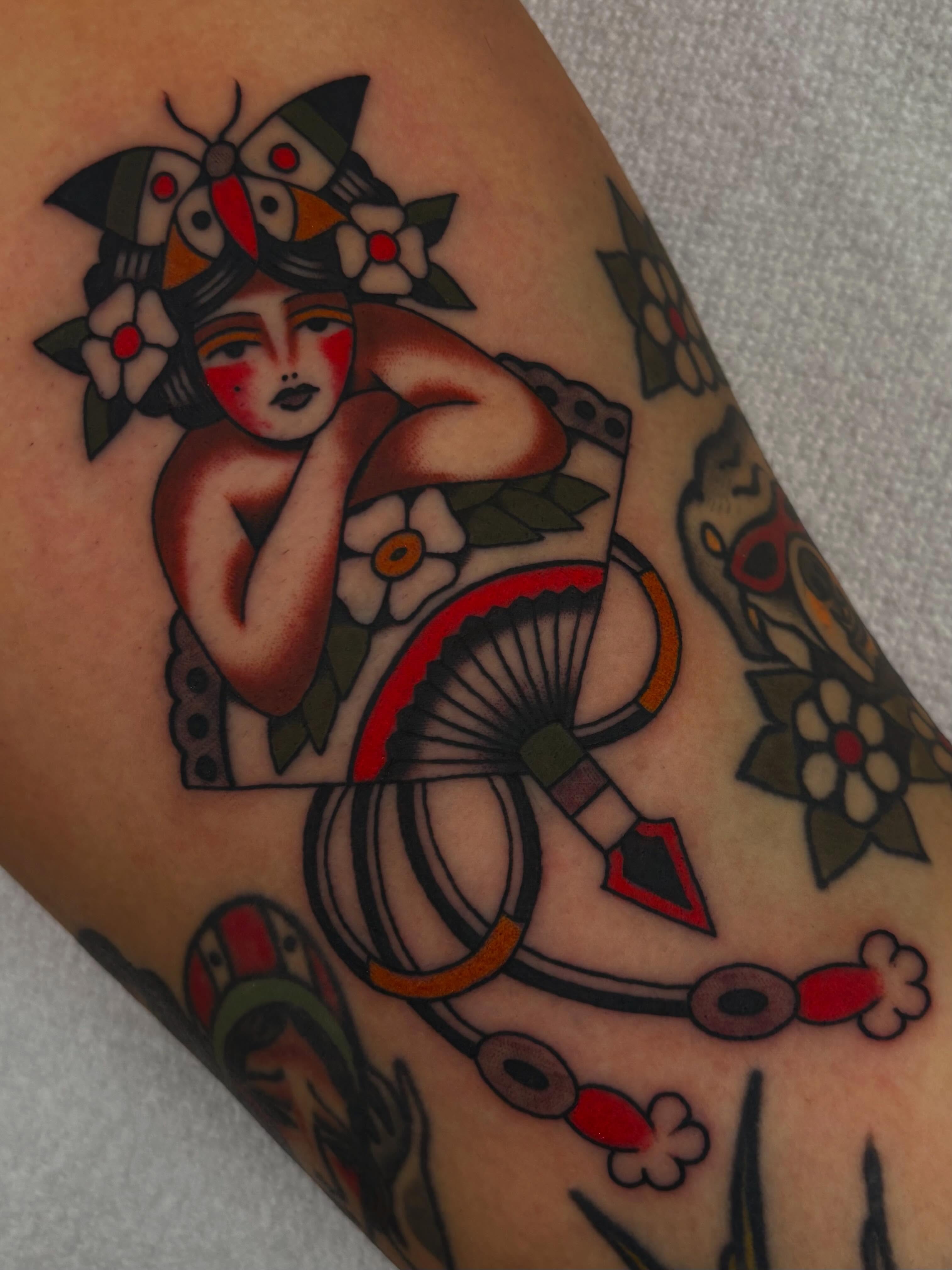 Flapper girl American traditional tattoo on the forearm by Claire Anderson