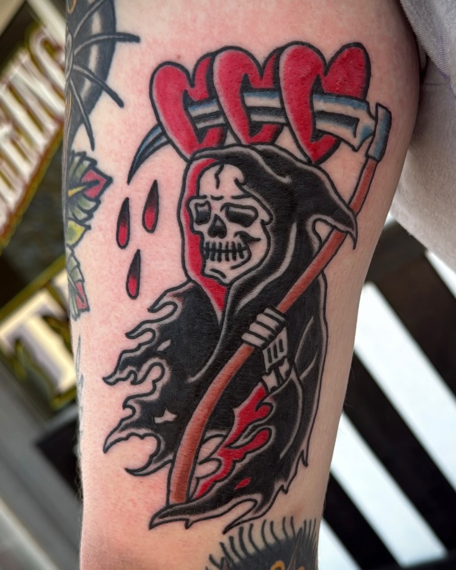 Grim reaper American traditional tattoo on the forearm by Zach Eden