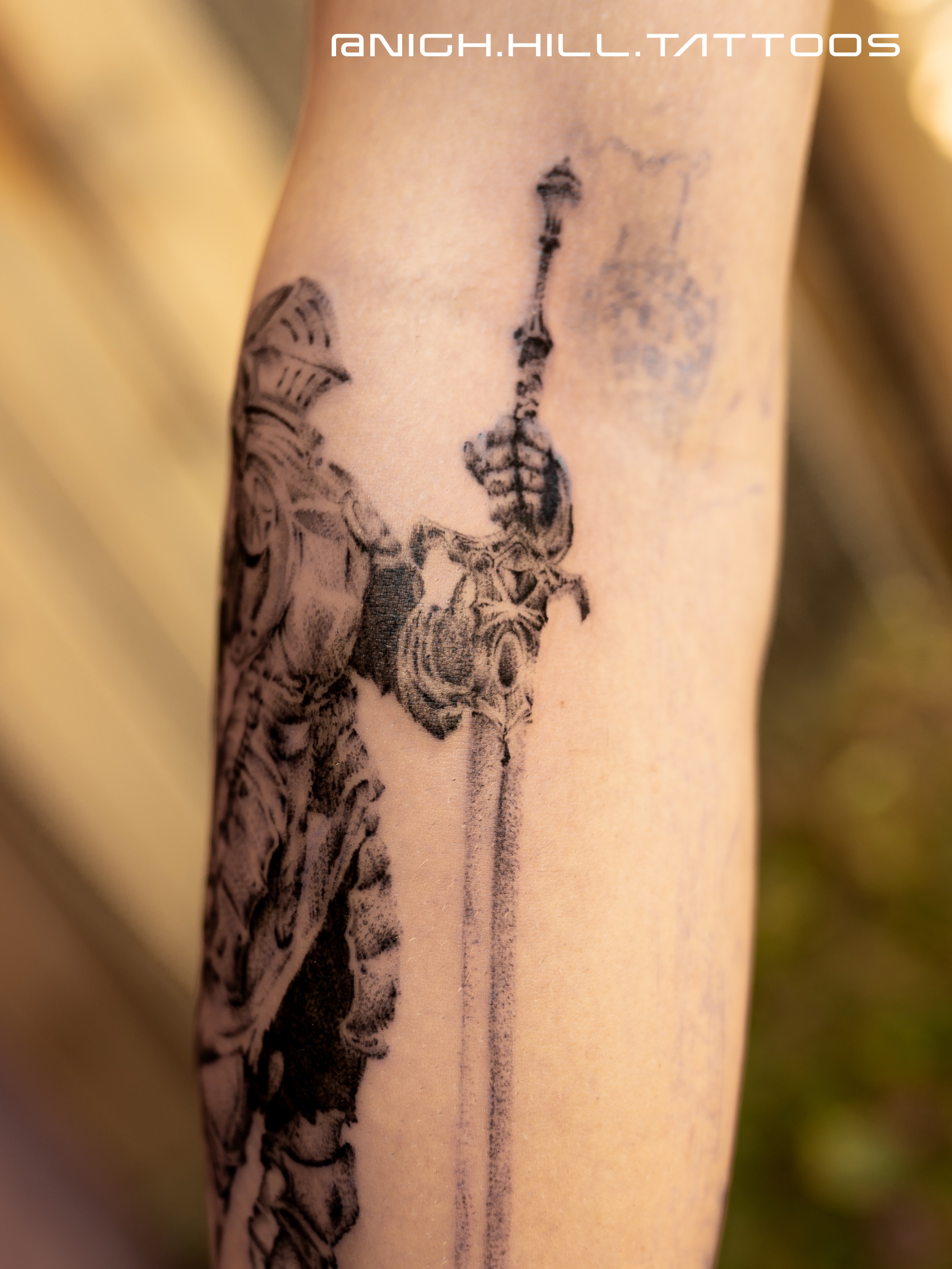 Warrior with sword black and grey tattoo on the forearm by Boise Tattoo Artist