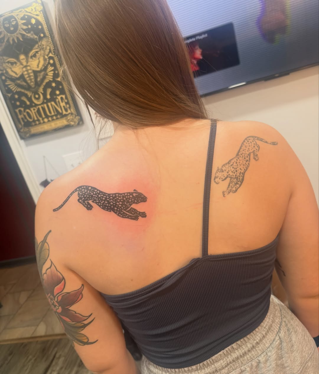 Leopard black and grey tattoo on the back by Brandie Caroline, Somers Point, New Jersey