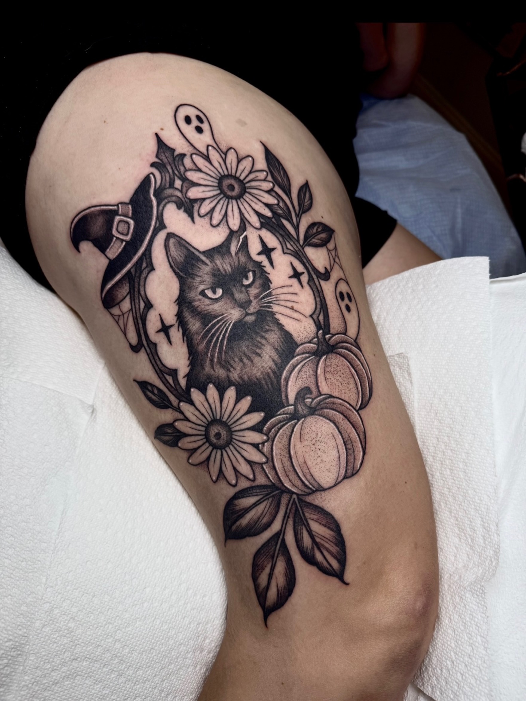 Cat and floral arrangement realism tattoo on the thigh by ⚡️ Krissy Fabis ⚡️