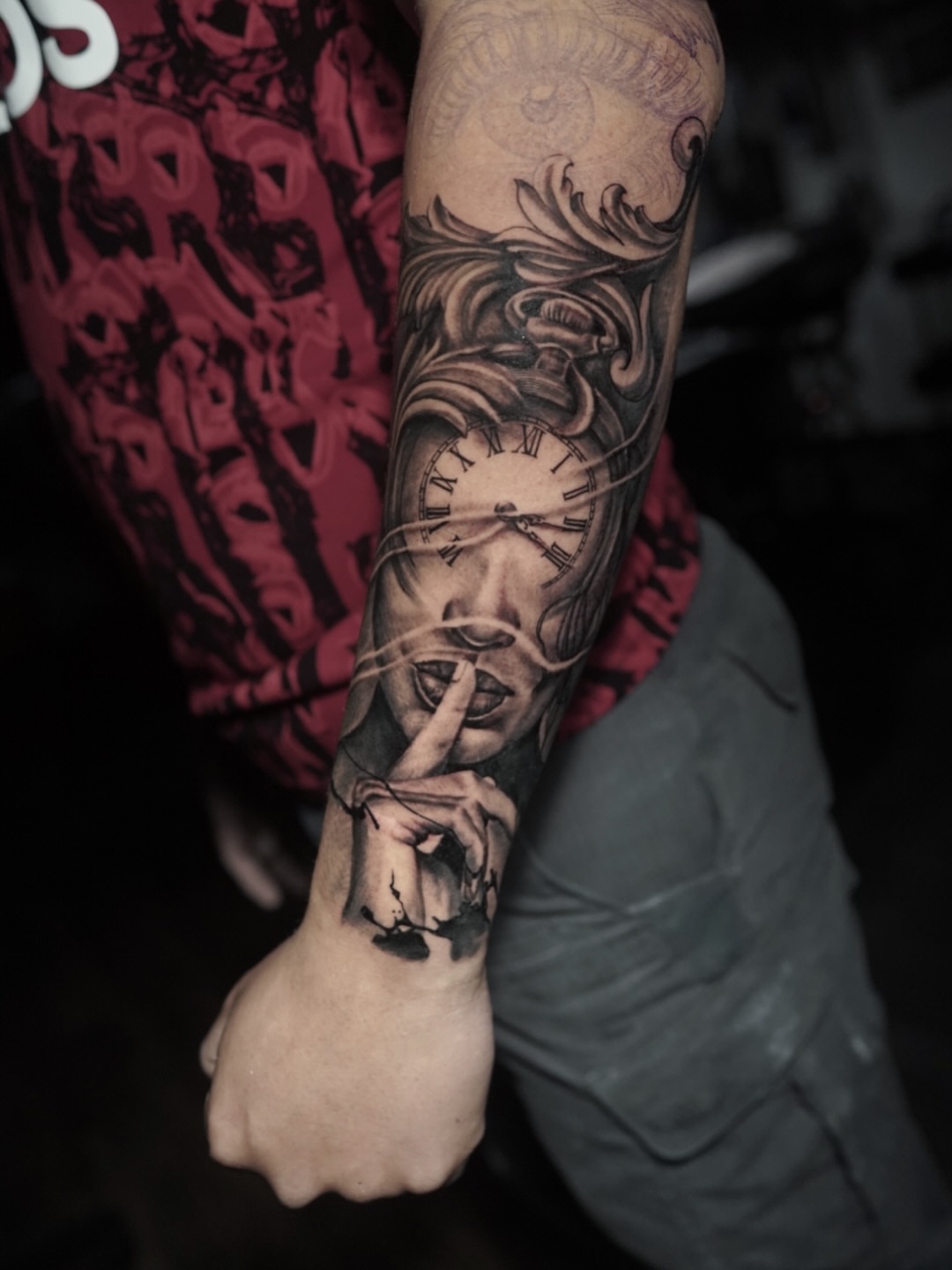 Clock and hand realism tattoo on the forearm by Niko Hosk Cataldo
