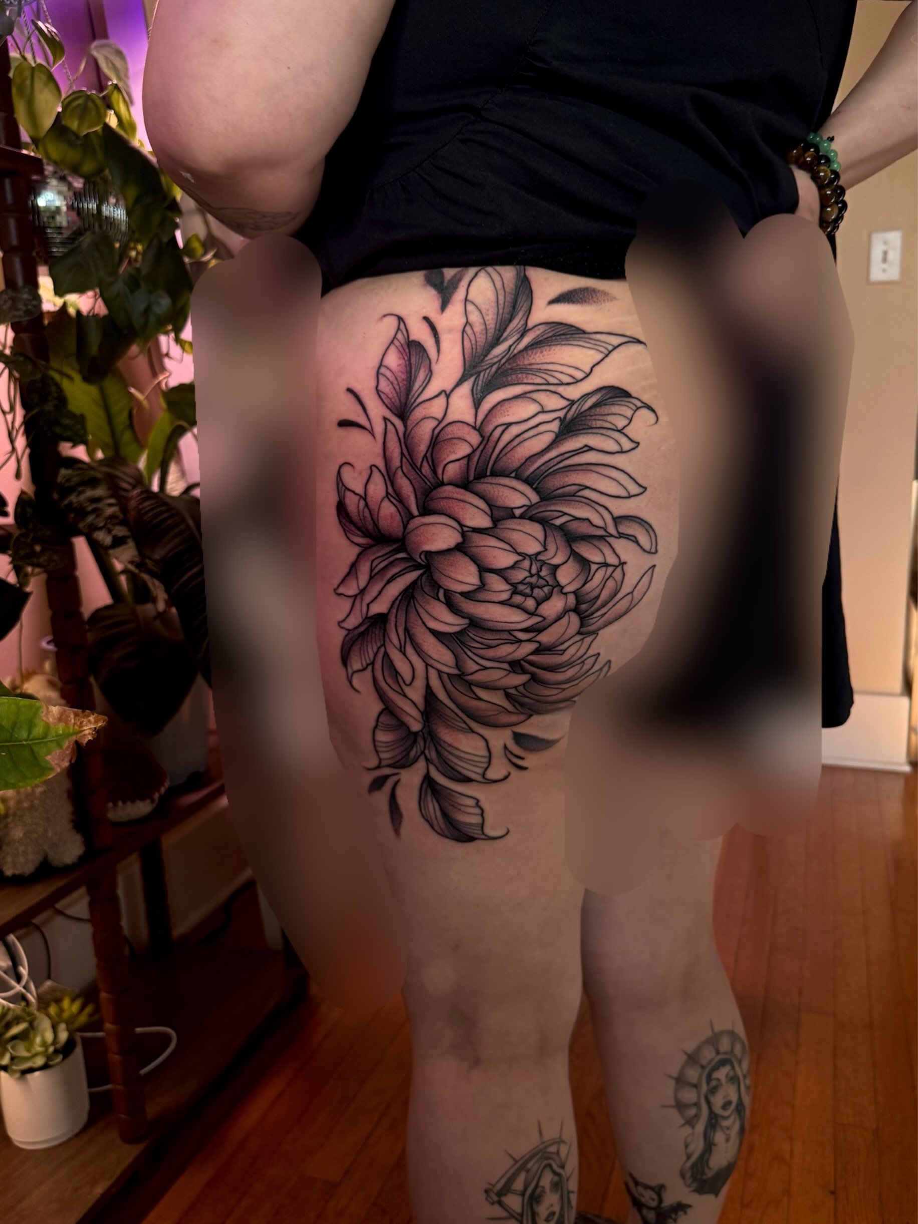 Chrysanthemum black and grey tattoo on the thigh by Angie Cotton