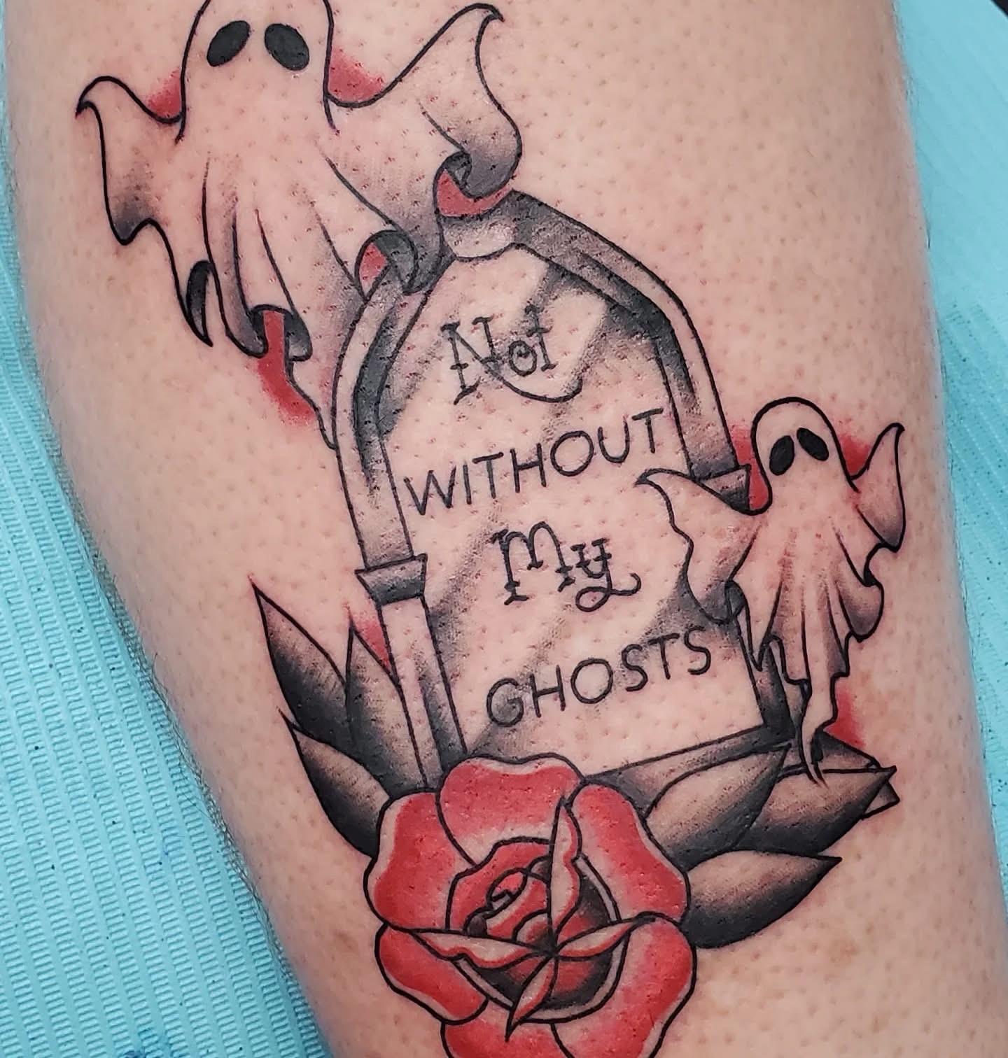 Ghosts and tombstone American traditional tattoo on the thigh by Cameron Mills - Tattoo artist