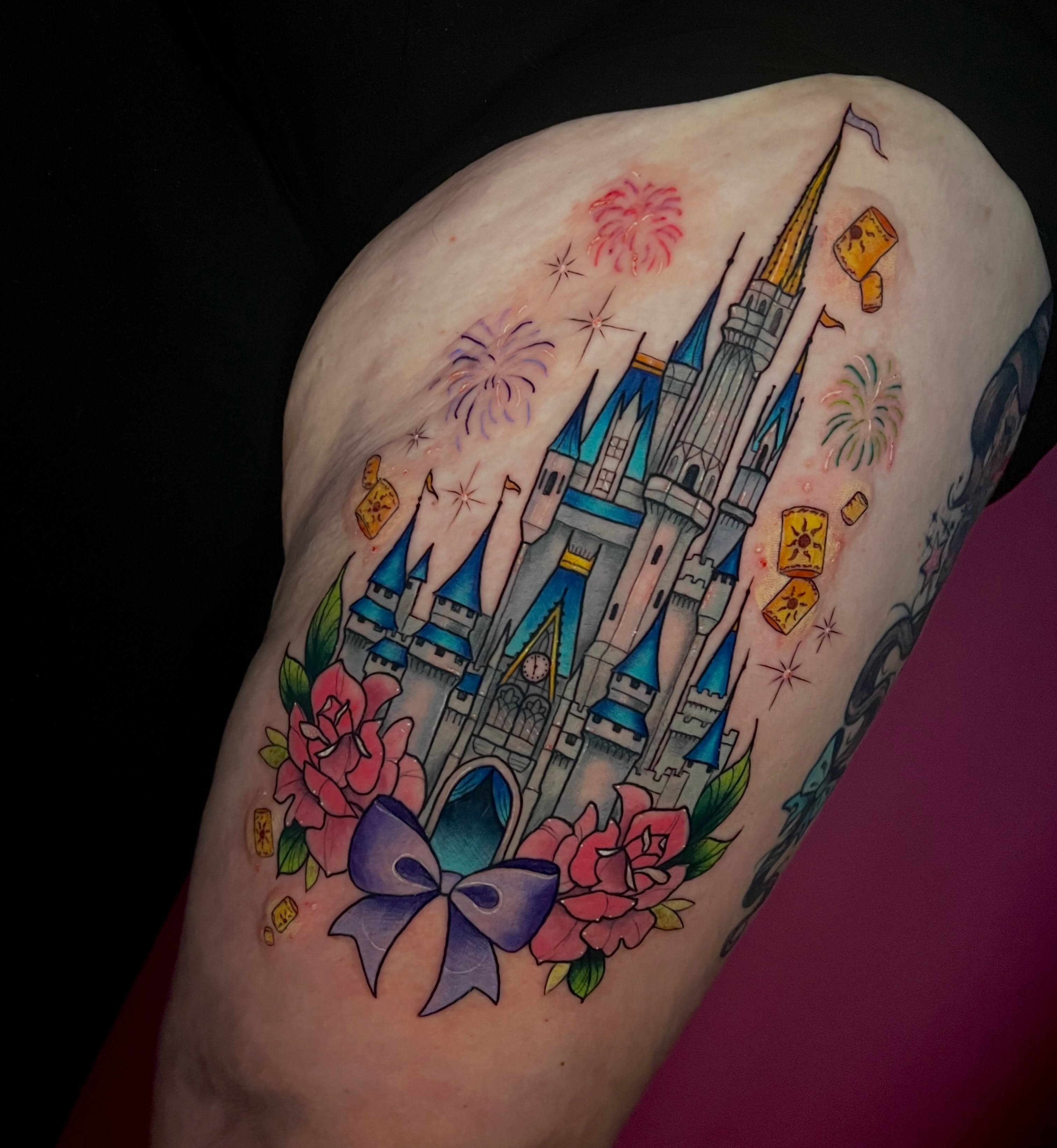 Castle with fireworks new school tattoo on the thigh by jessica valentine