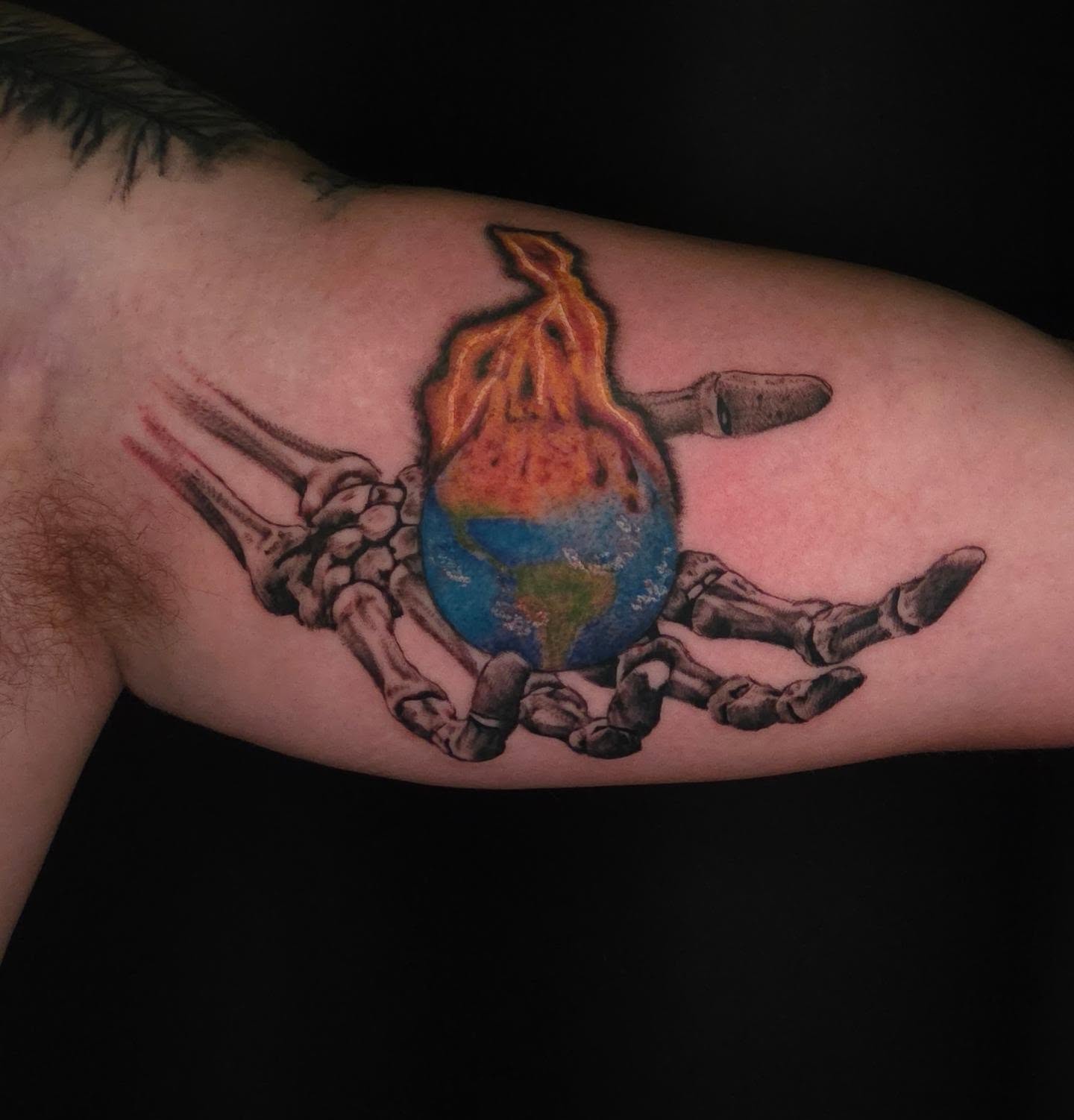 Crab with globe realism tattoo on the forearm by Maya Neideck