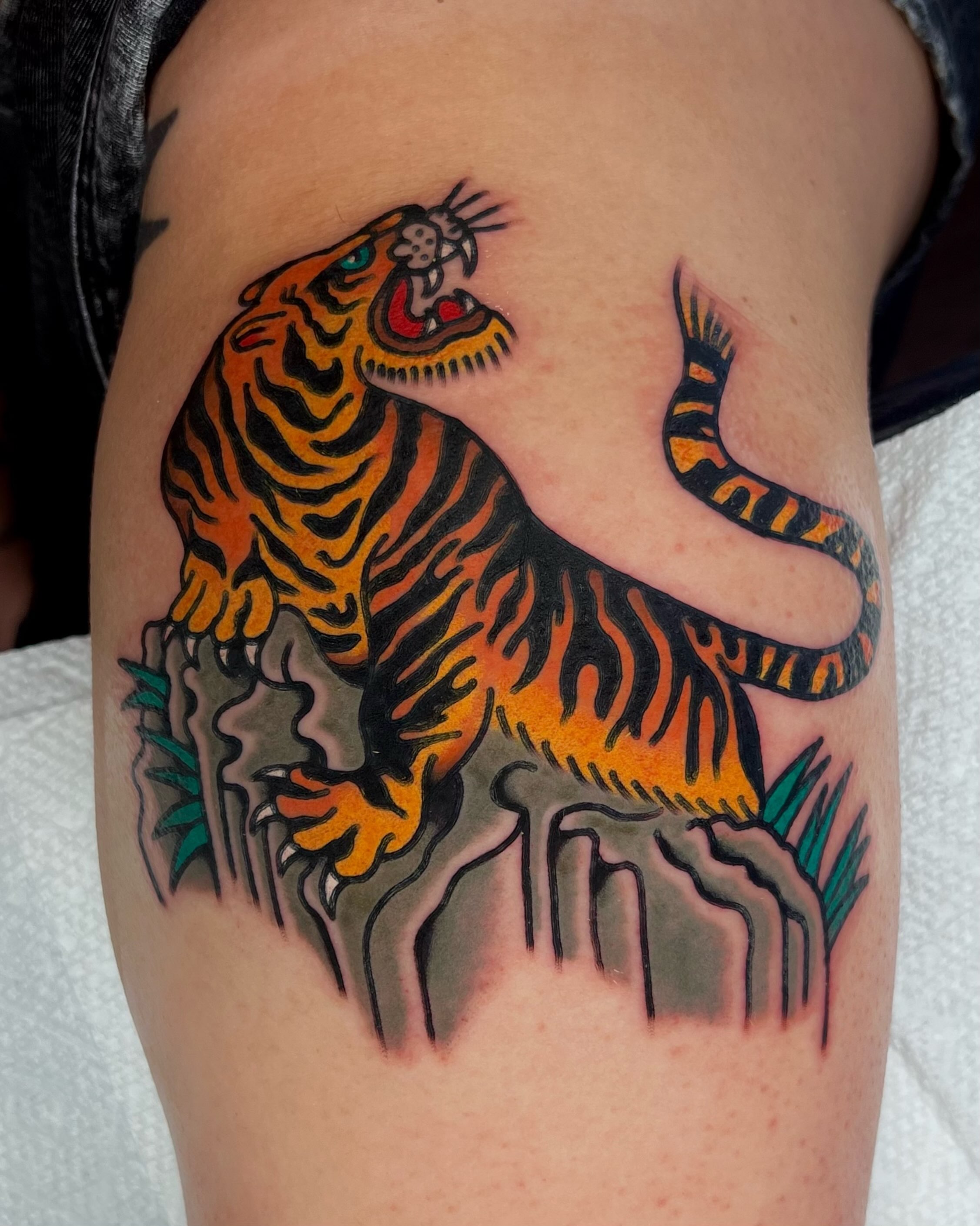 Tiger American traditional tattoo on the thigh by 💧cry Bby💧