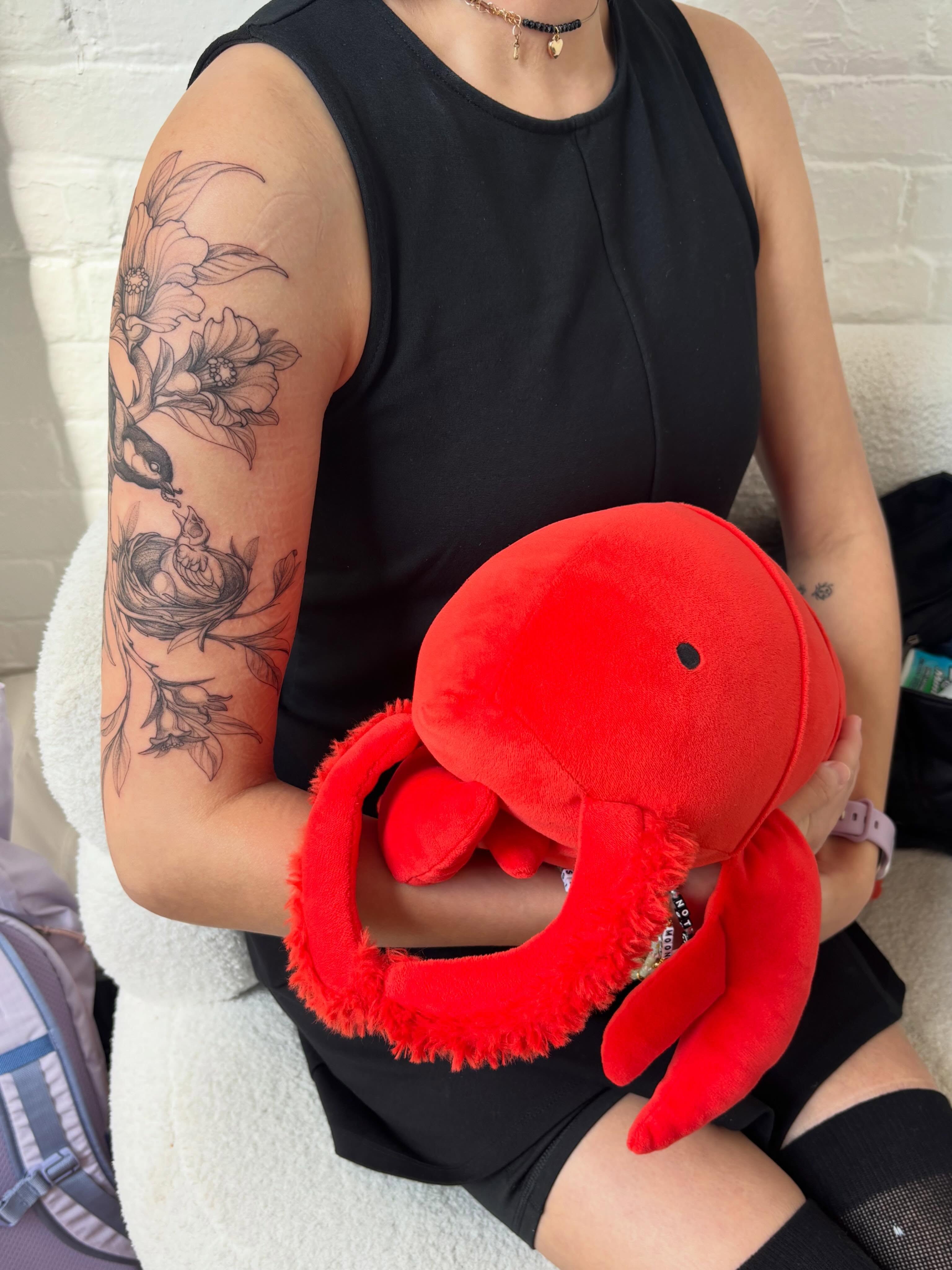 Bird and floral American traditional tattoo on the upper arm by vaprol tattoo ✧ Boston