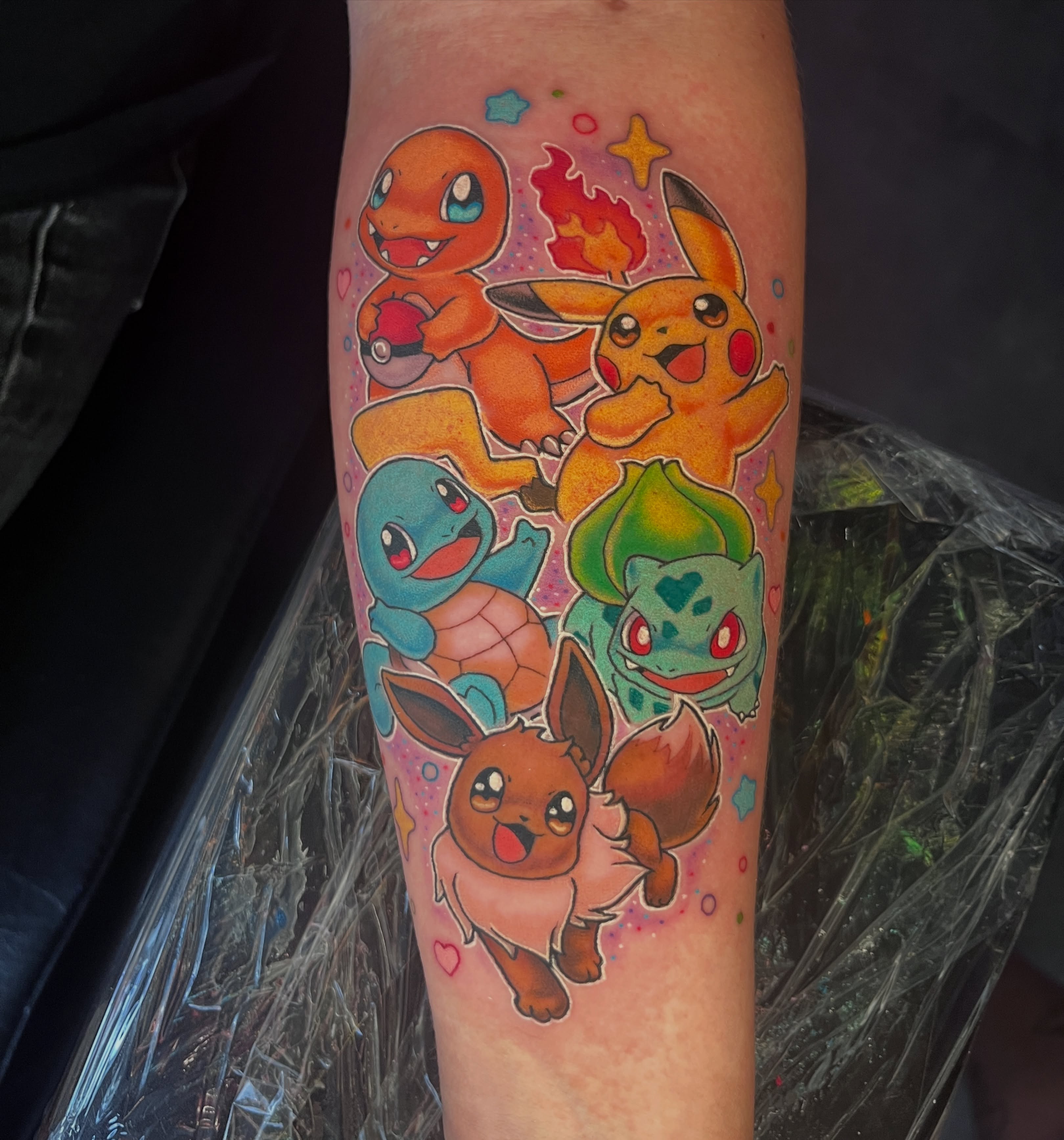 Pokemon characters new school tattoo on the forearm by Cheyanne Peck