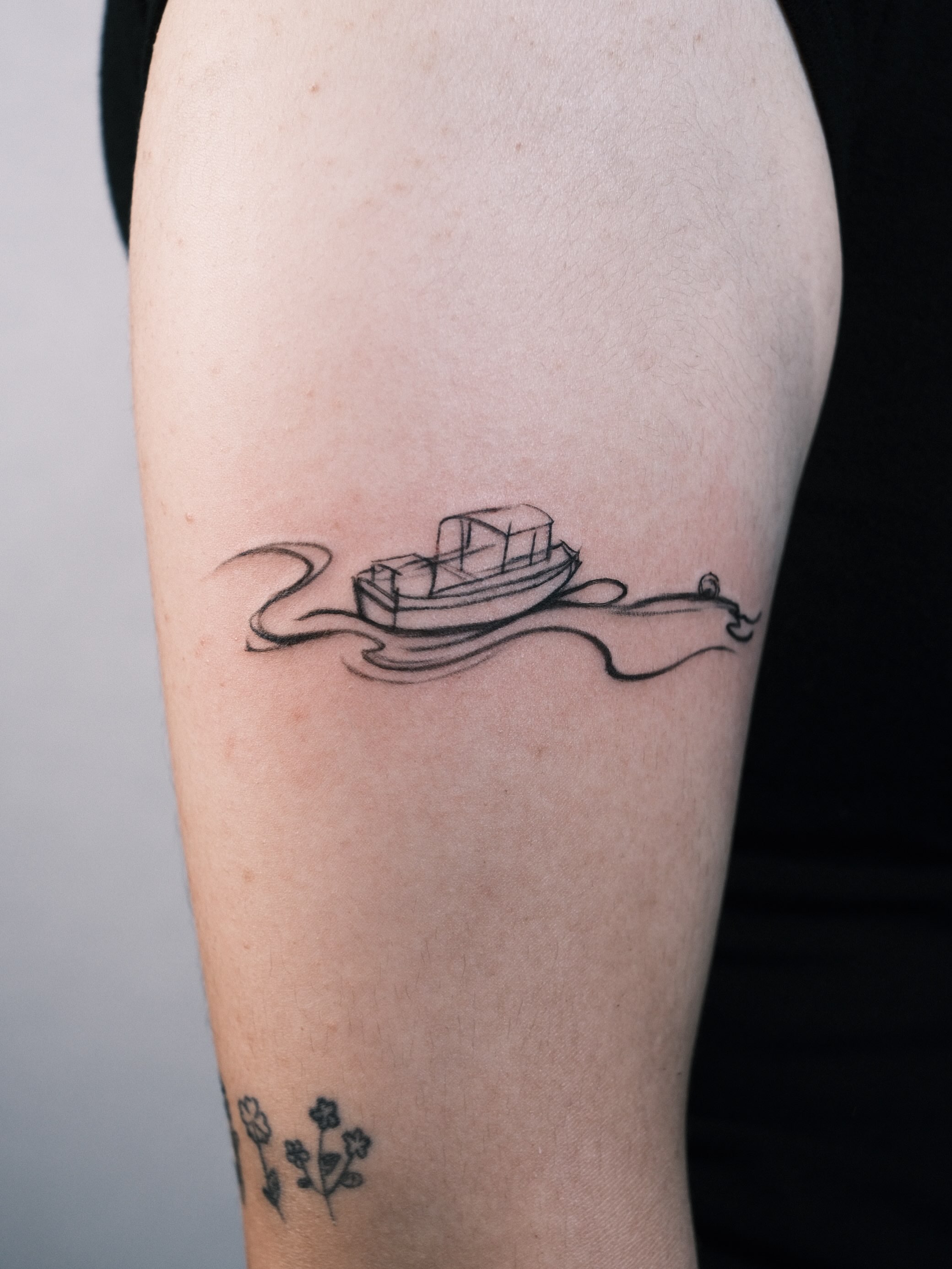 Boat minimalist tattoo on the forearm by Jinz