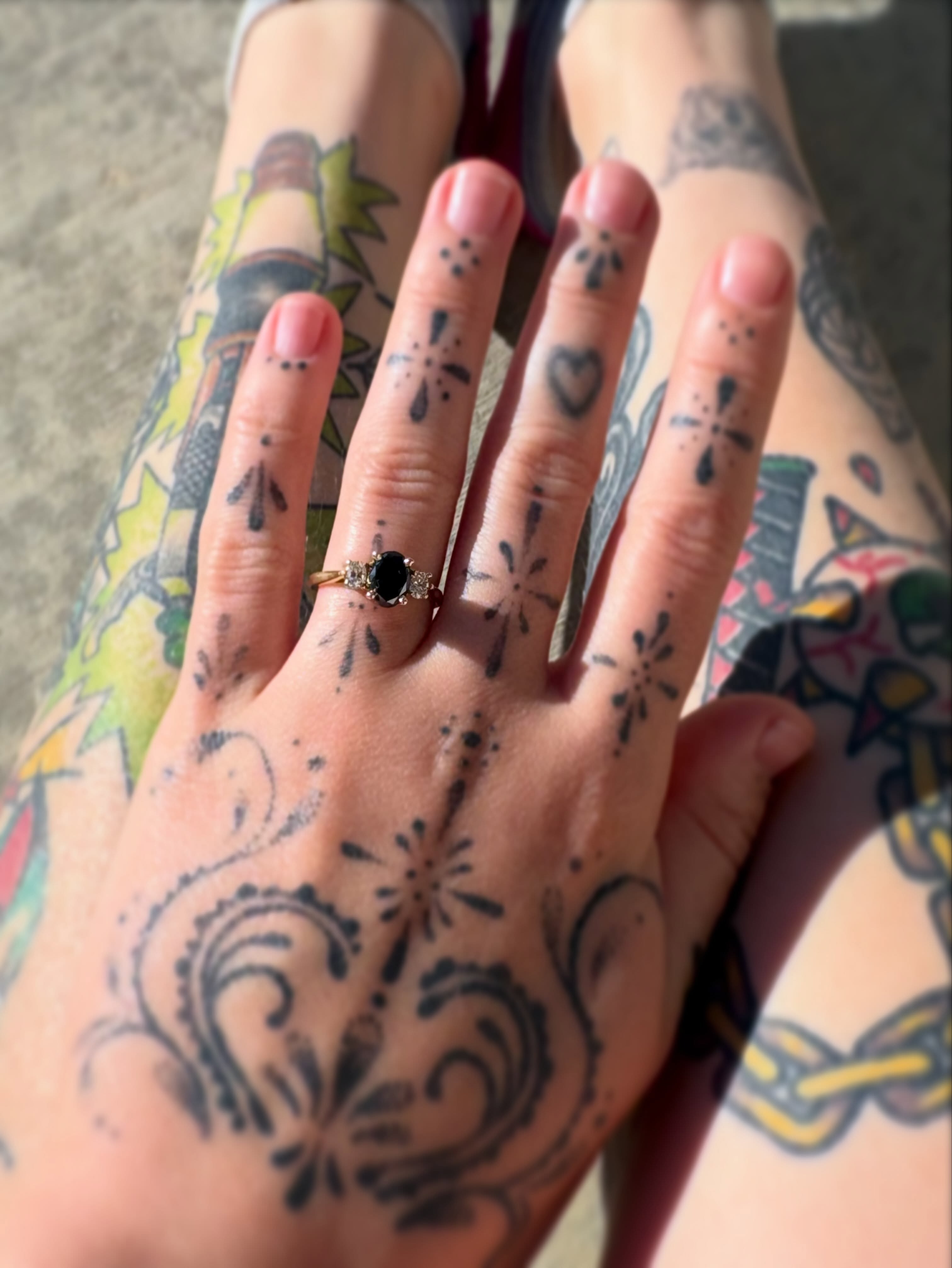 Hand with intricate patterns dotwork tattoo on the hand by Ava Brady Tattoos