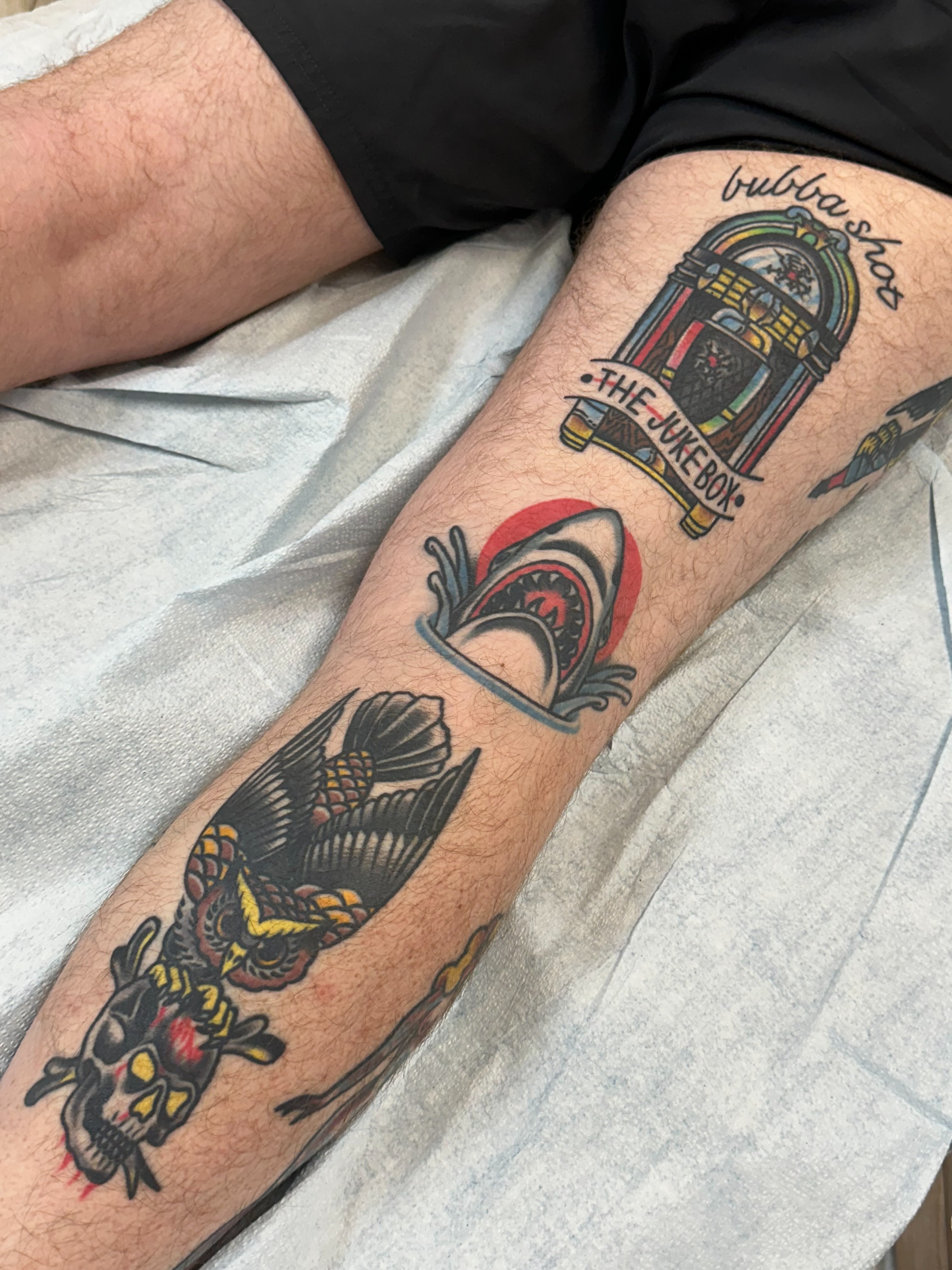 Jukebox shark American traditional tattoo on the forearm by Spencer Crawford, Speedway, Indiana