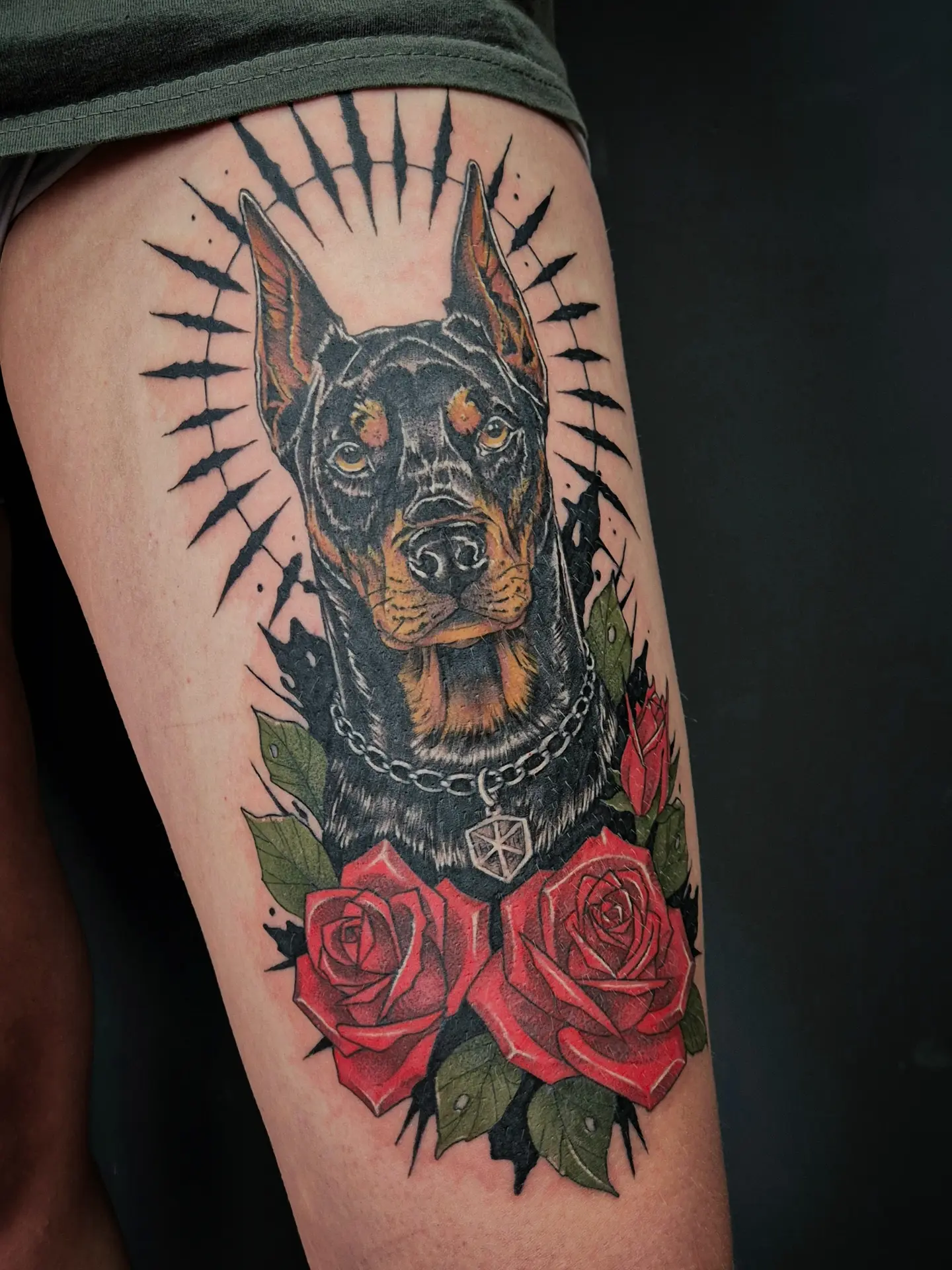 Doberman with roses realism tattoo on the thigh by Тату Херсон _ Kherson tattoo, Kherson