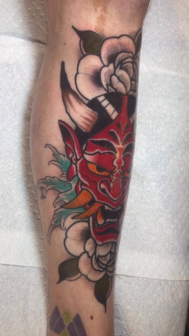 Oni mask with flowers japanese irezumi tattoo by Todd Showdown