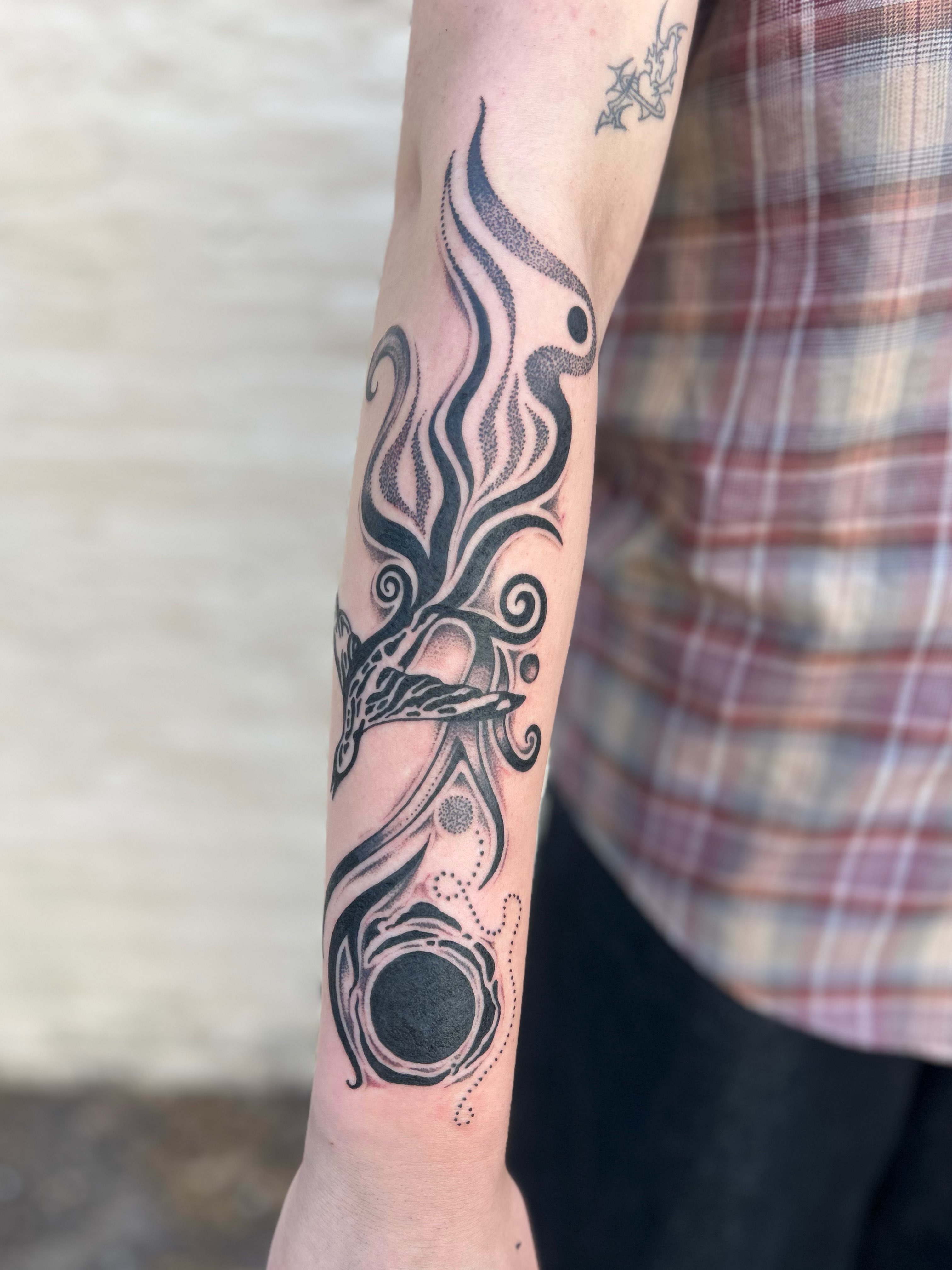 Abstract flame dotwork tattoo on the forearm by ✧✦ ☻ ✦✧
