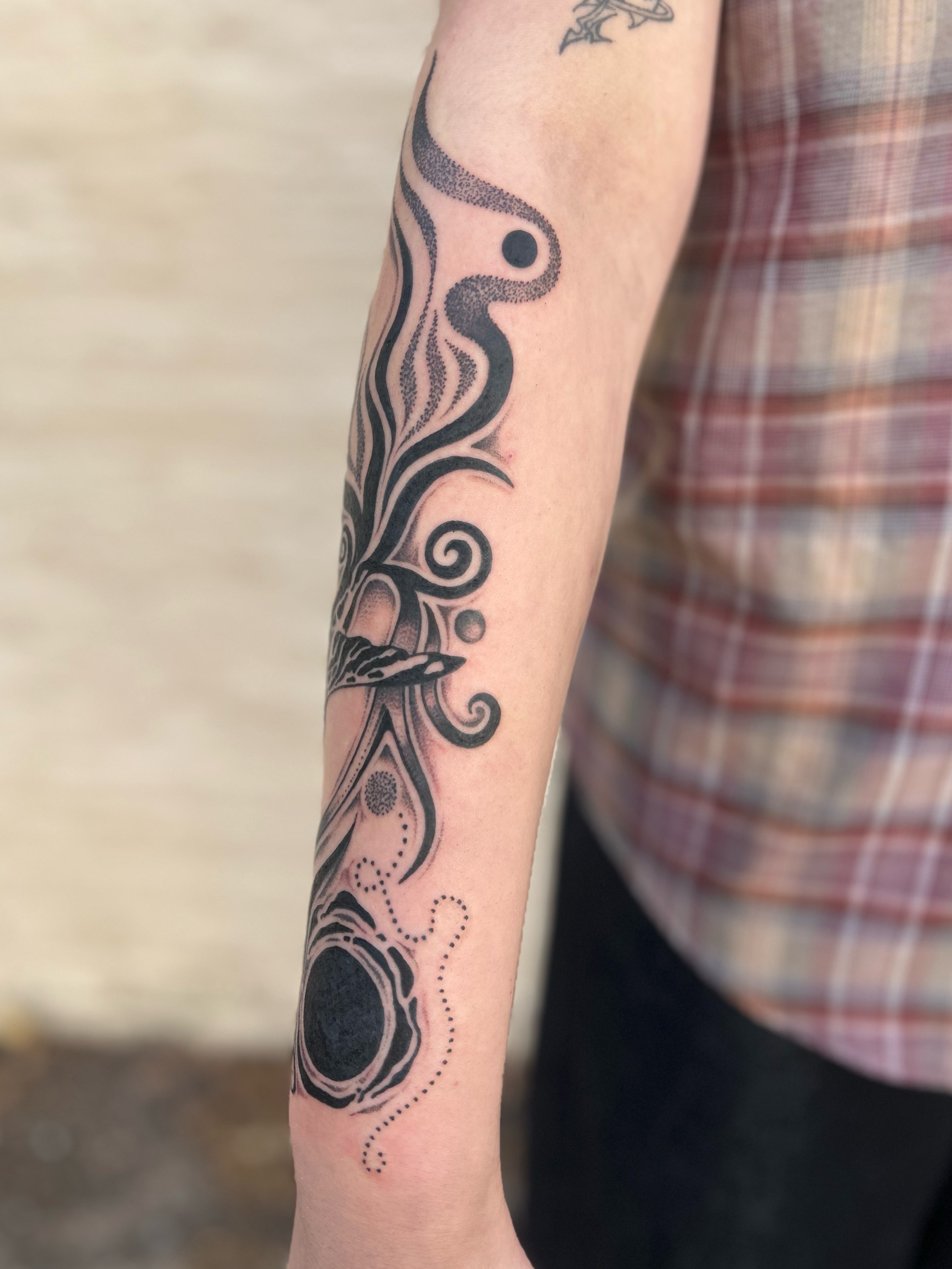 Abstract flame dotwork tattoo on the forearm by ✧✦ ☻ ✦✧