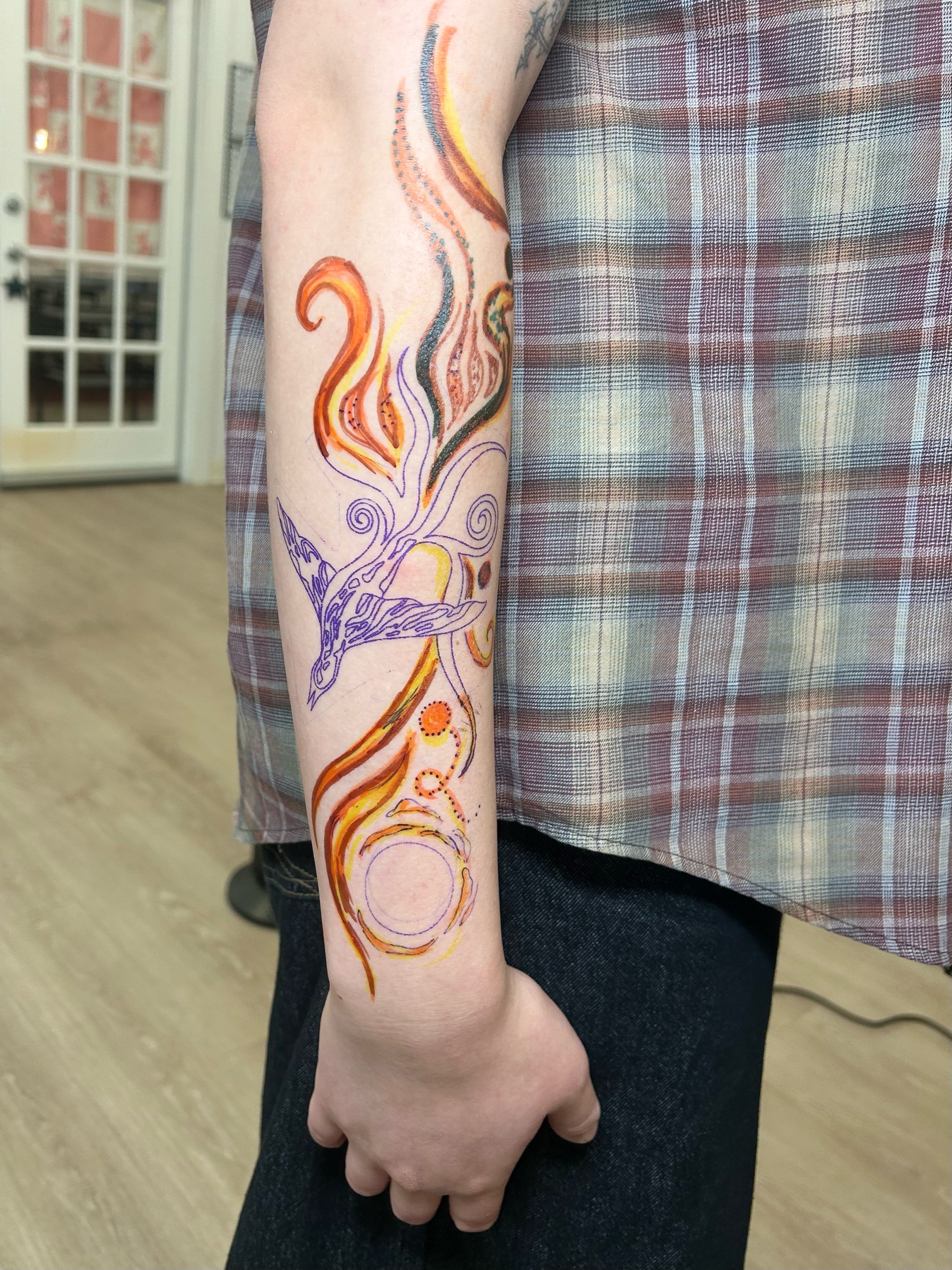 Flame and bird watercolor tattoo on the forearm by ✧✦ ☻ ✦✧