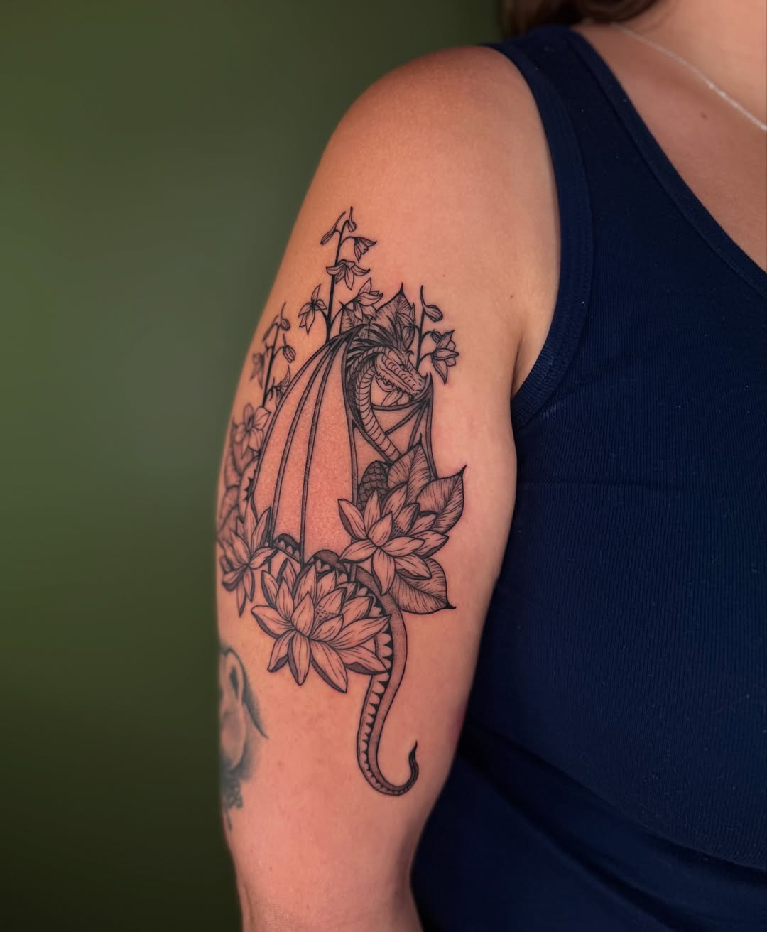 Snake and lotus black and grey tattoo on the upper arm by ๐ฅ ๐๐ฅ๐๐ฑ๐ข๐ฌ ๐ฅ