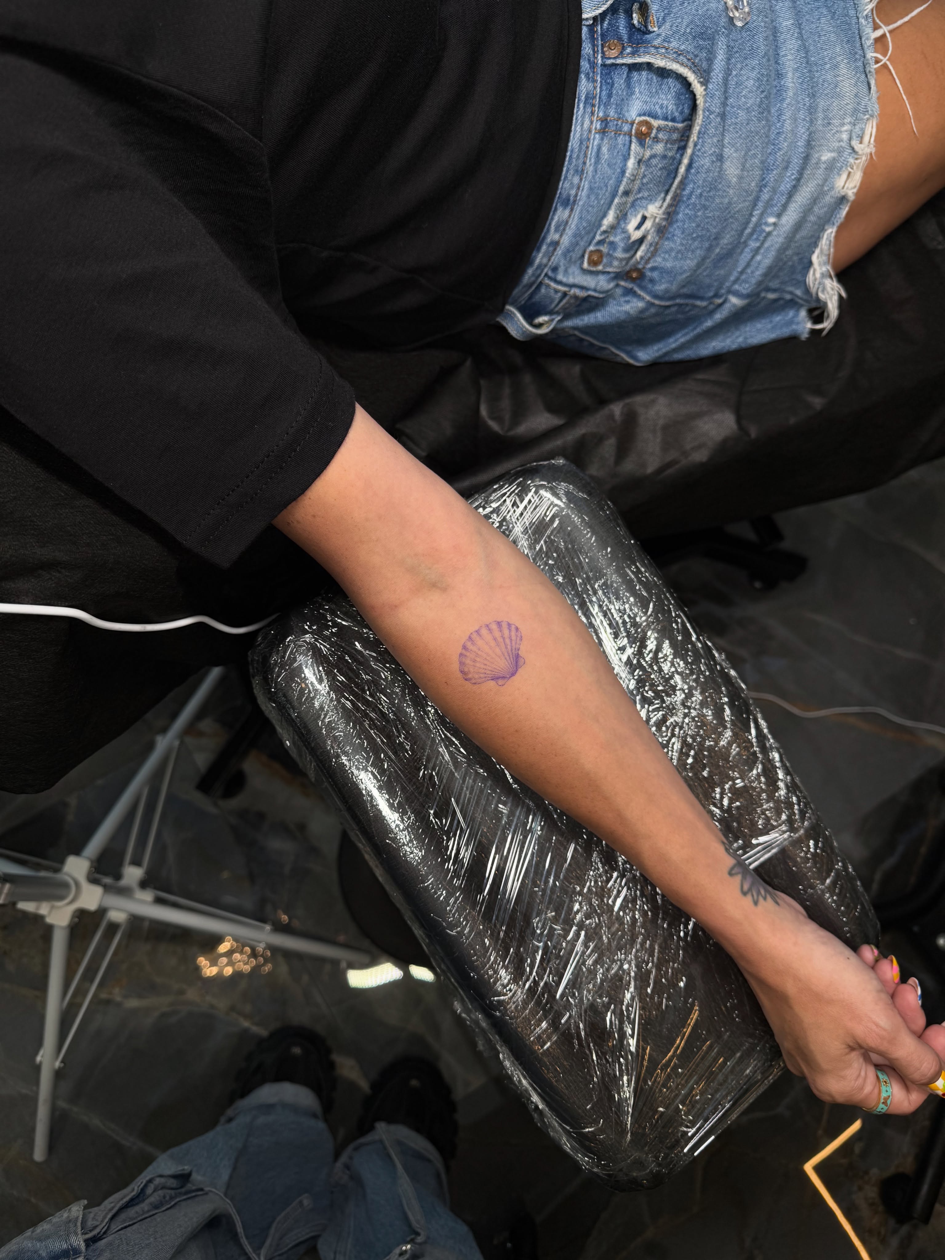 Seashell dotwork tattoo on the forearm by Your tattoo Artist, New York, New York