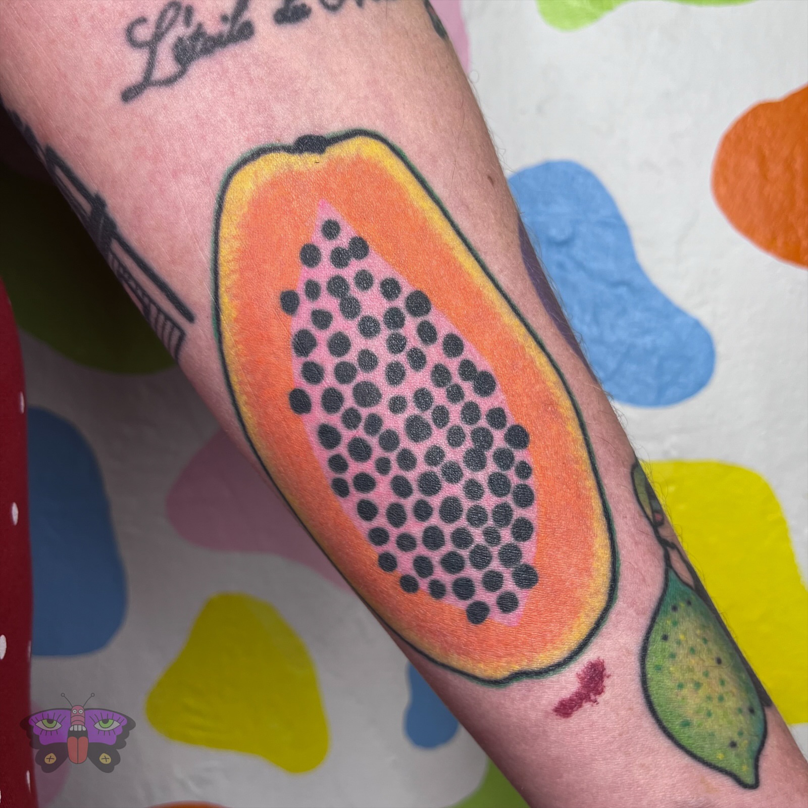 Papaya dotwork tattoo on the forearm by Jess Koala, San Francisco, California