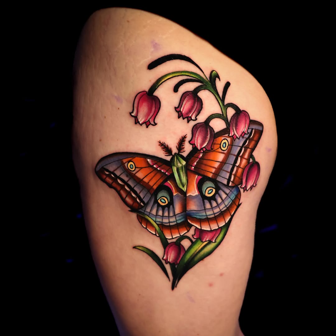 Butterfly and flowers American traditional tattoo on the shoulder by Haleigh Cunningham, Charlotte, North Carolina
