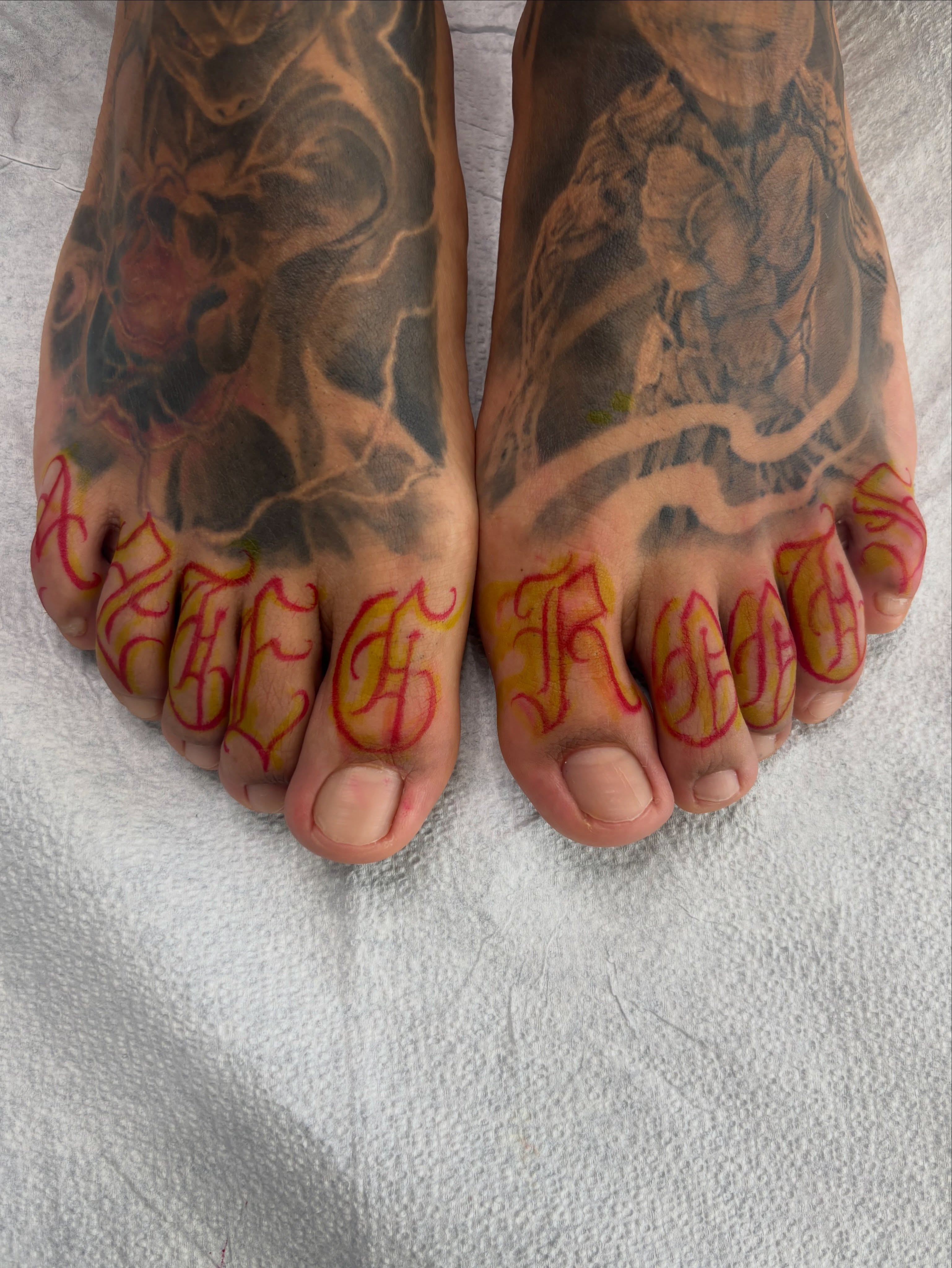Script lettering lettering script tattoo on the foot by Cristiano Ochoa, Elk Grove, California